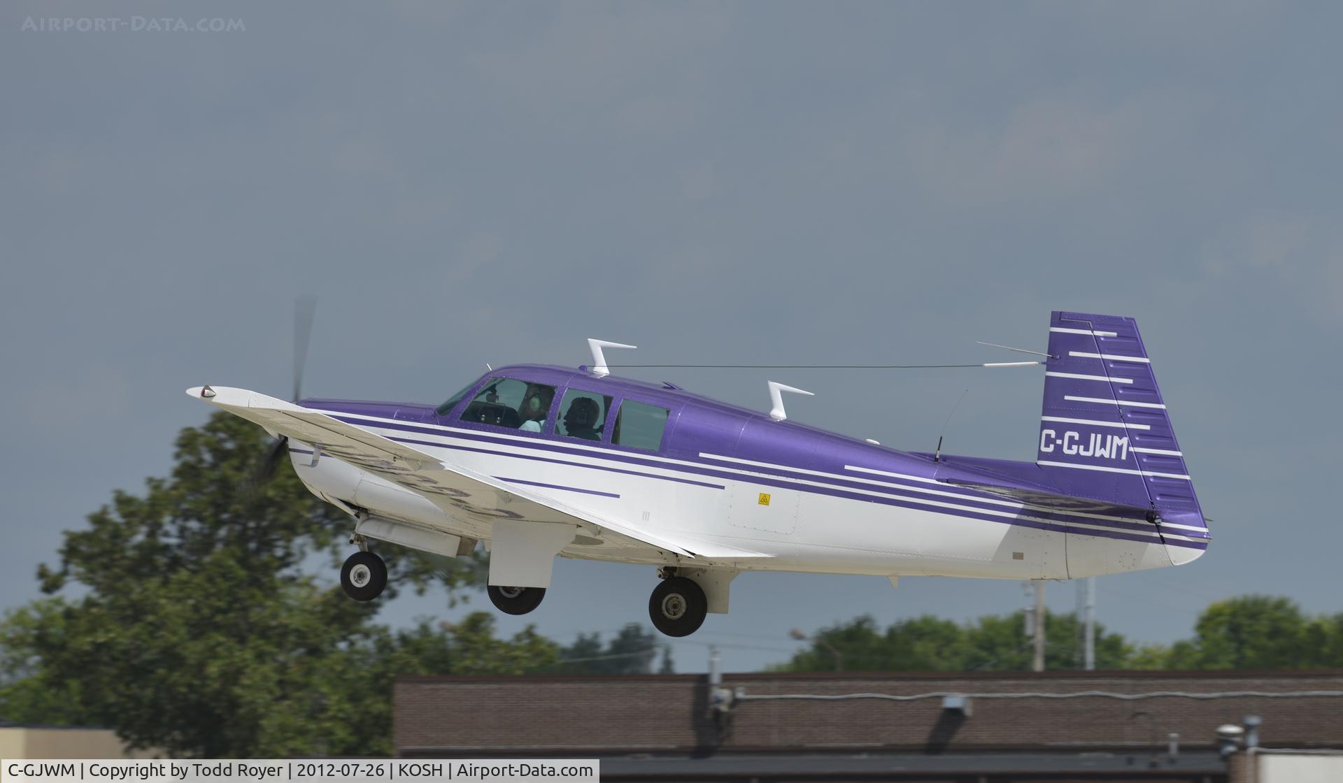 C-GJWM, 1975 Mooney M20F Executive C/N 22-1287, Departing Airventure 2012