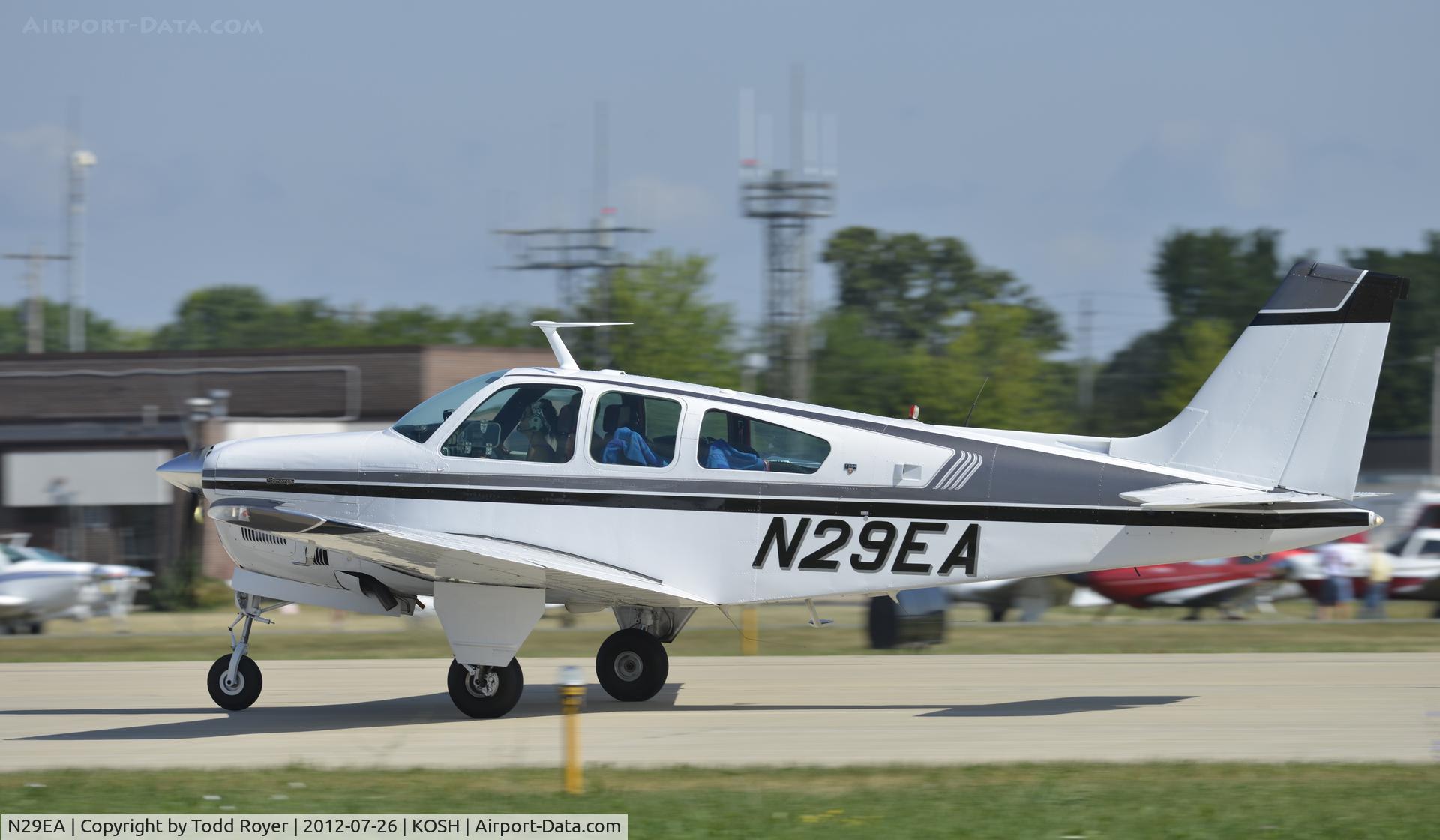 N29EA, 1976 Beech F33A Bonanza C/N CE622, Departing Airventure 2012