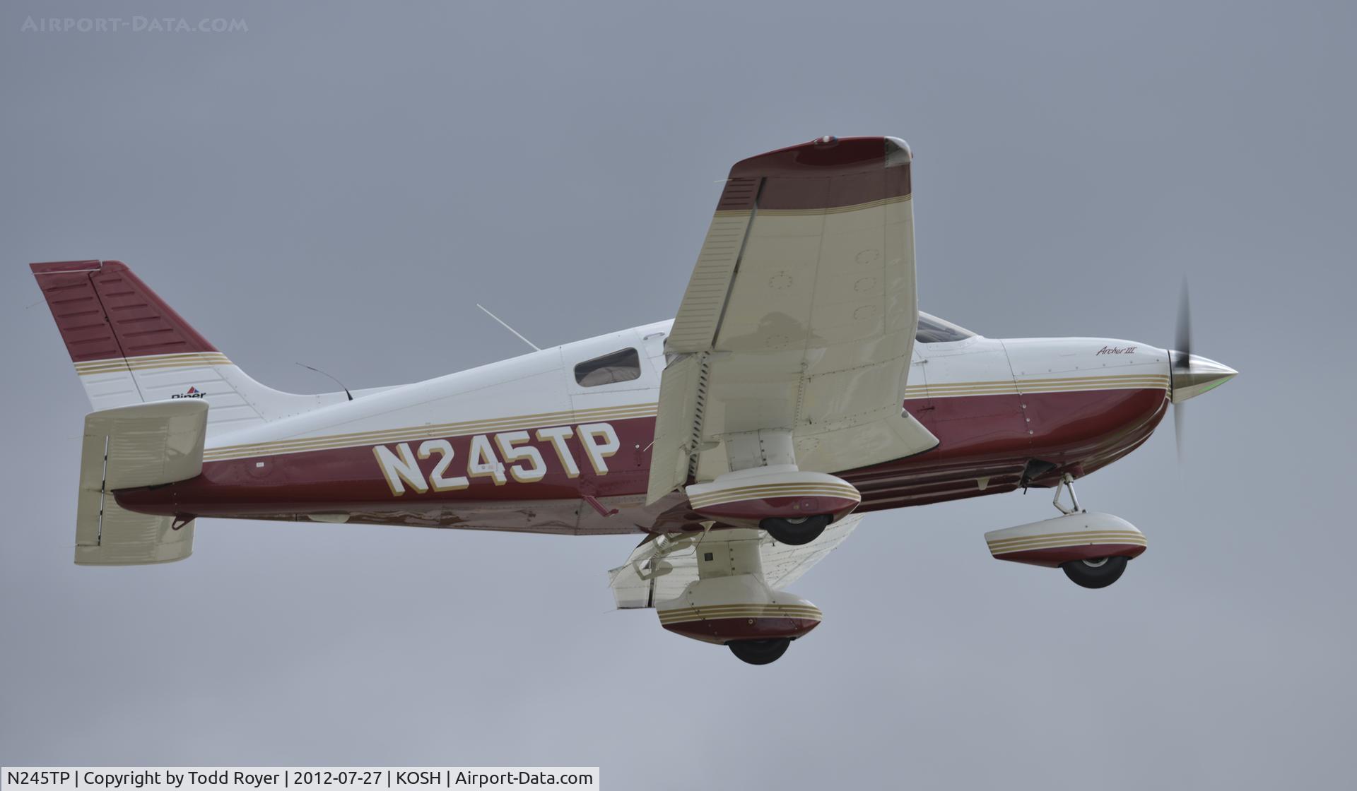 N245TP, 1999 Piper PA-28-181 Archer C/N 2843301, Departing Airventure 2012