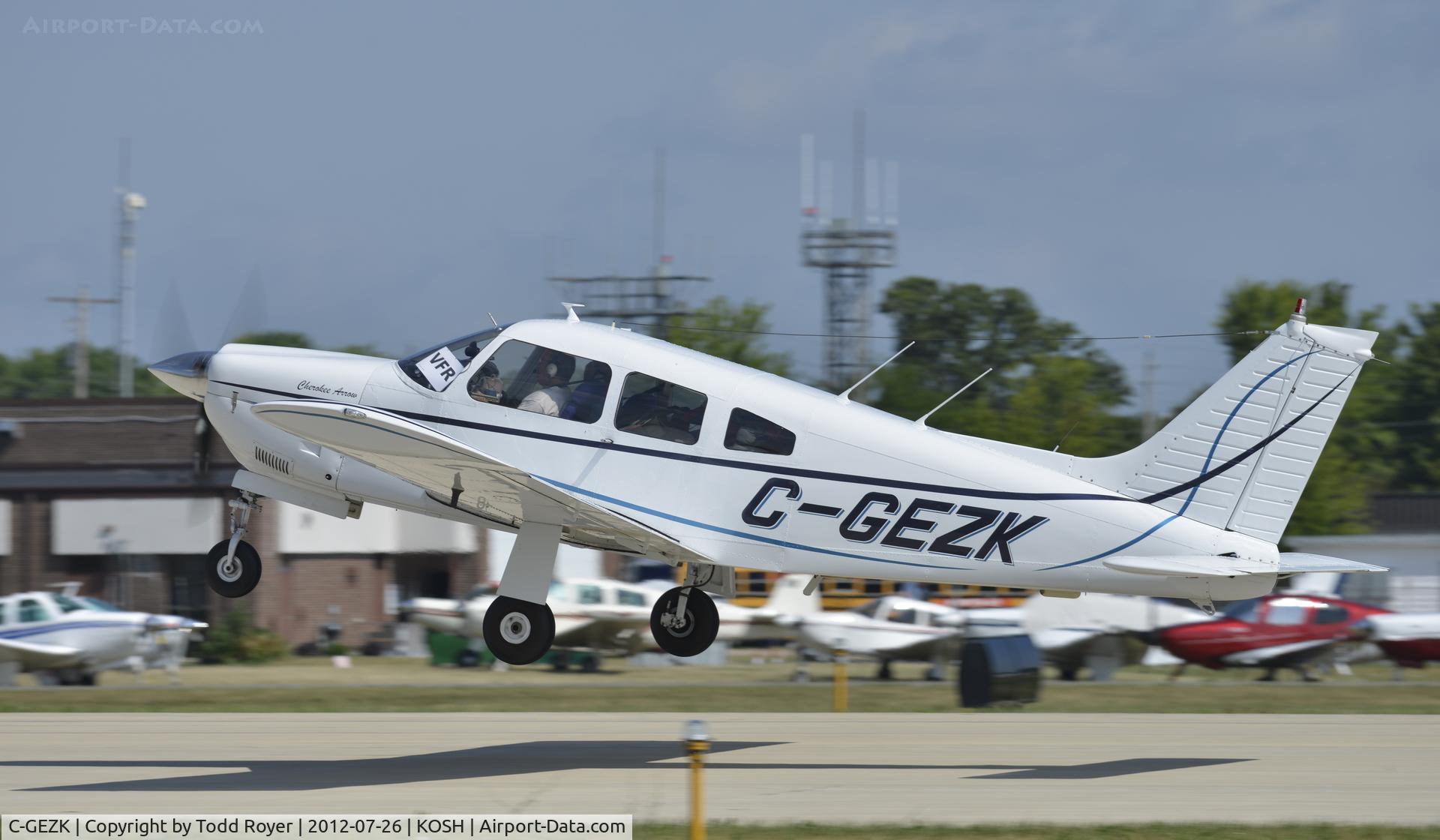C-GEZK, 1976 Piper PA-28R-200 Cherokee Arrow C/N 28R-7635138, Departing Airventure 2012