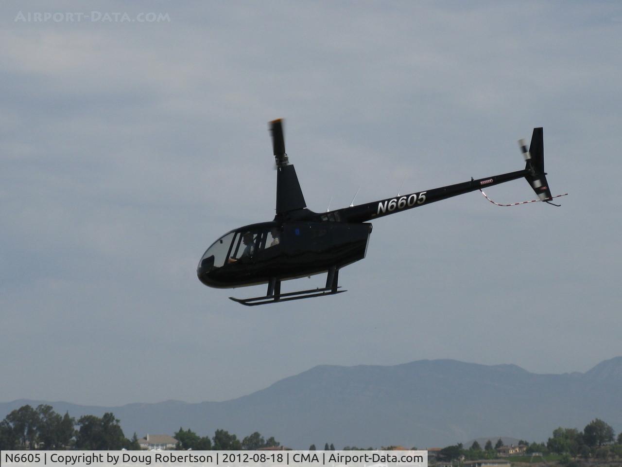 N6605, 2010 Robinson R66 Turbine C/N 0005, 2011 Robinson R66 TURBINE, one Rolls-Royce R300 turboshaft 300 Hp, departure with passengers from the flight line