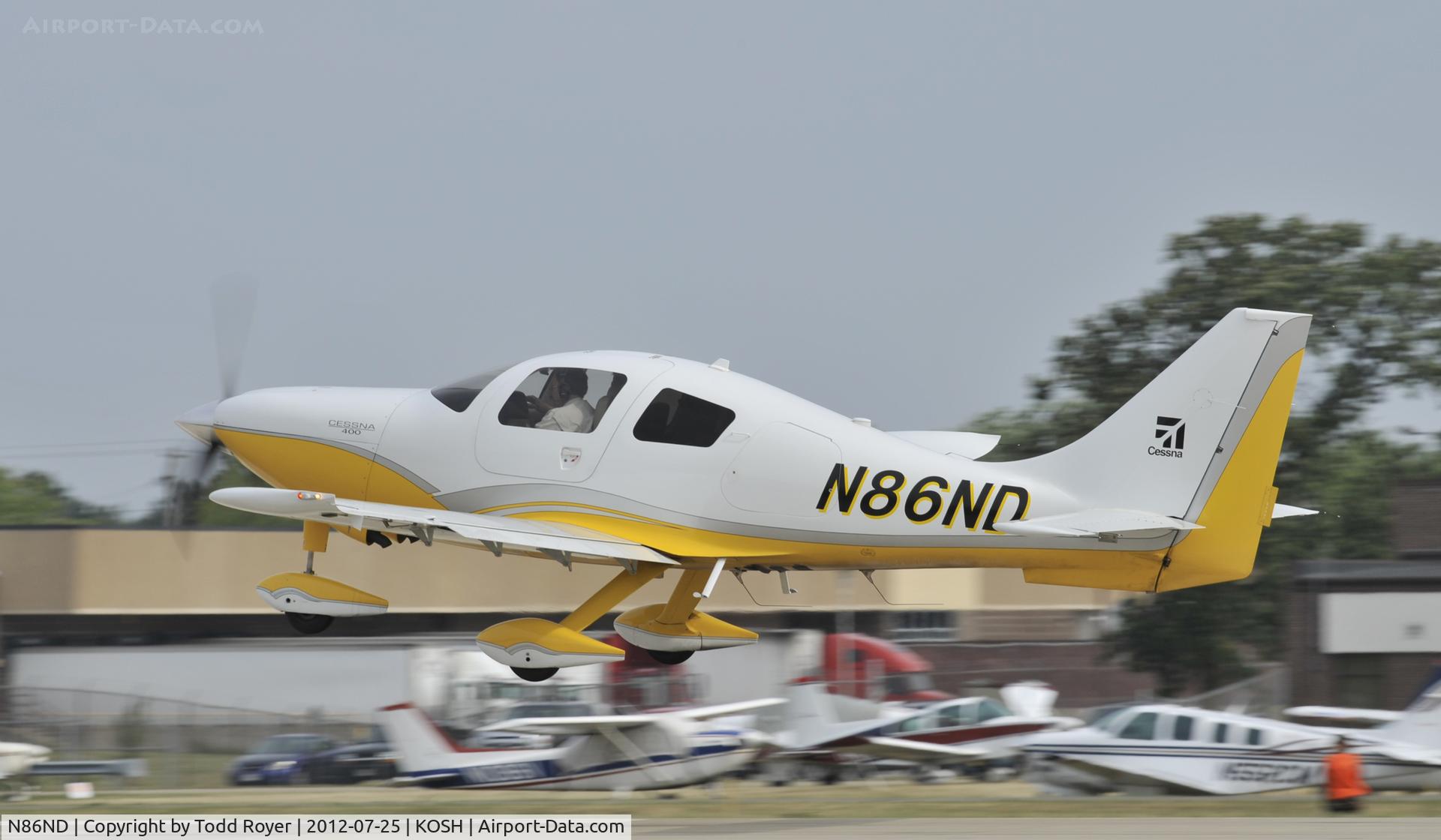N86ND, 2008 Cessna LC41-550FG C/N 411080, Departing Airventure 2012
