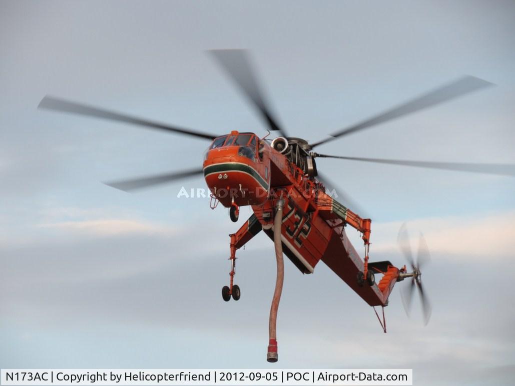 N173AC, 1967 Sikorsky S-64E C/N 64015, Pulling nose up to slow down over dirt area north of 26R east of the tower
