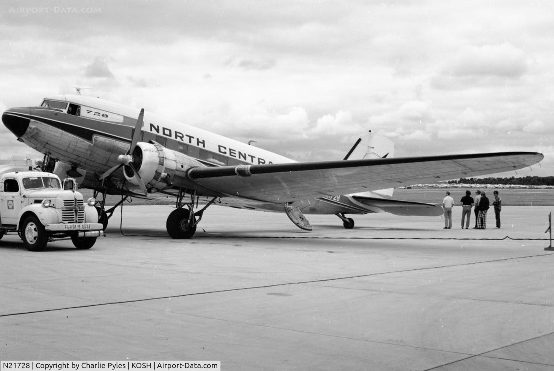 N21728, 1939 Douglas DC-3-G202A C/N 2144, North Central's N21728 was the World's High Time DC-3 in 1974 when I was allowed to ride from the terminal ramp at Oshkosh to the air show line.