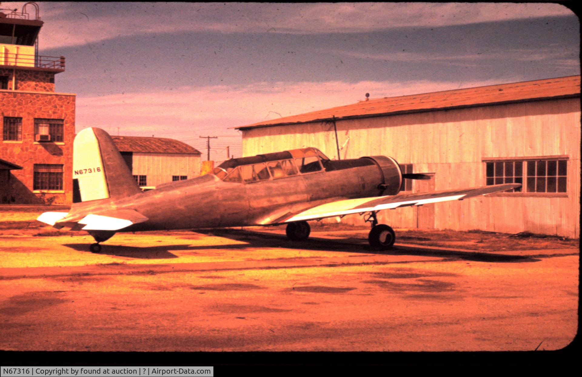 N67316, 1942 Consolidated Vultee BT-13A C/N 7652, slide found at auction, photographer, date, location unknown. Circa 1958