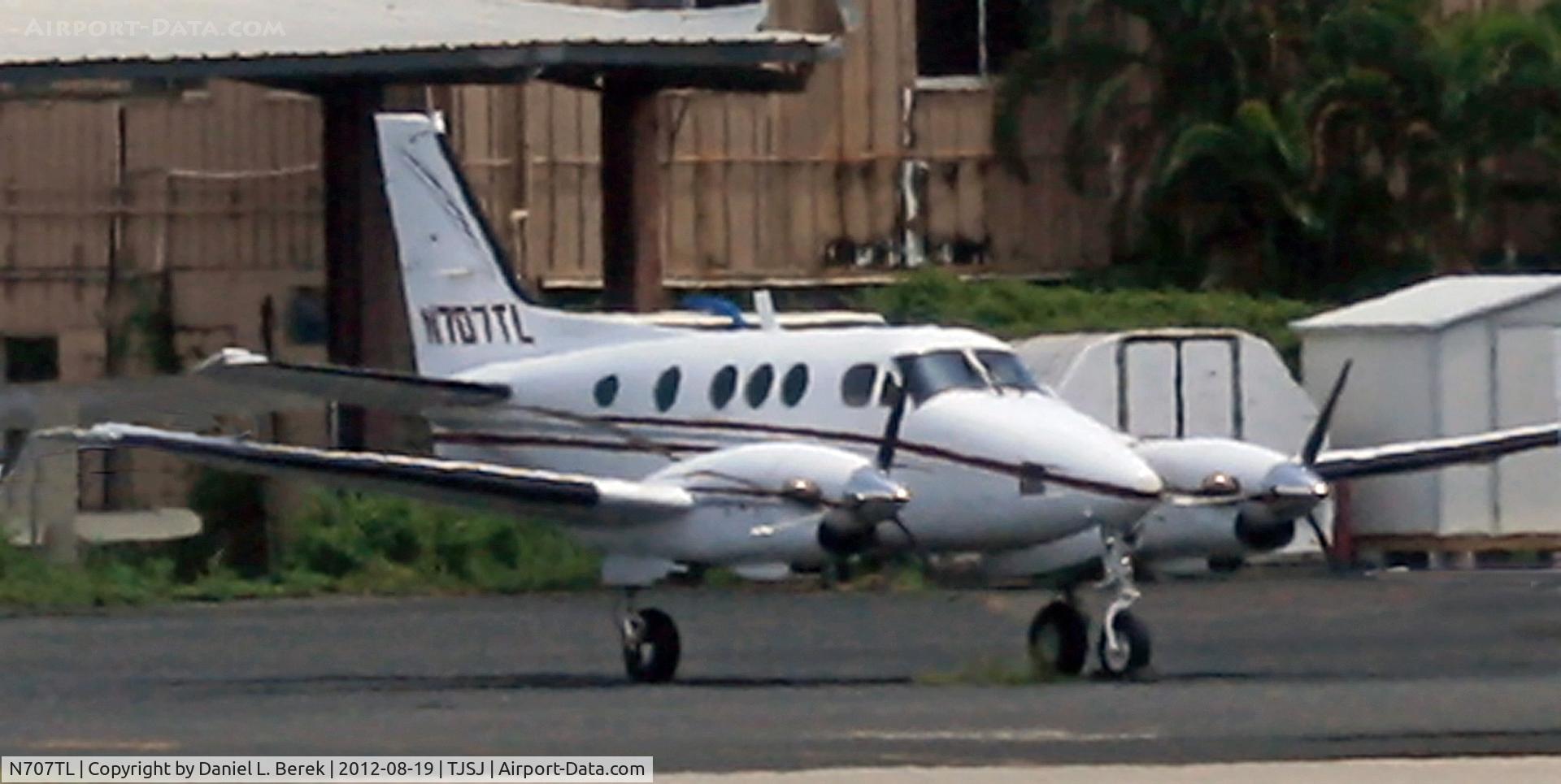 N707TL, 1976 Beech E-90 King Air C/N LW-173, Sitting among friends on the general aviation ramp at SJU.