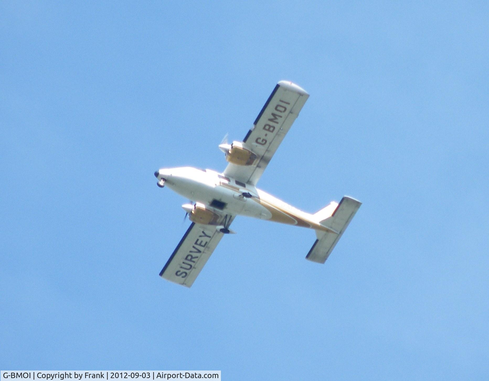 G-BMOI, 1977 Partenavia P-68B C/N 103, Over flew Walsall Wood WS9- W/M 3/4  times  this pic was timed at 12.24 . Bit of a rush to get my camera so not able to set up did it on auto bit blury.