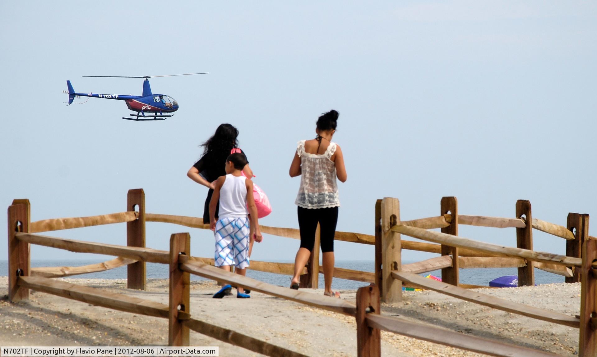 N702TF, 2001 Robinson R44 C/N 1029, Shot on Atlantic City seashore, near the Luna Park