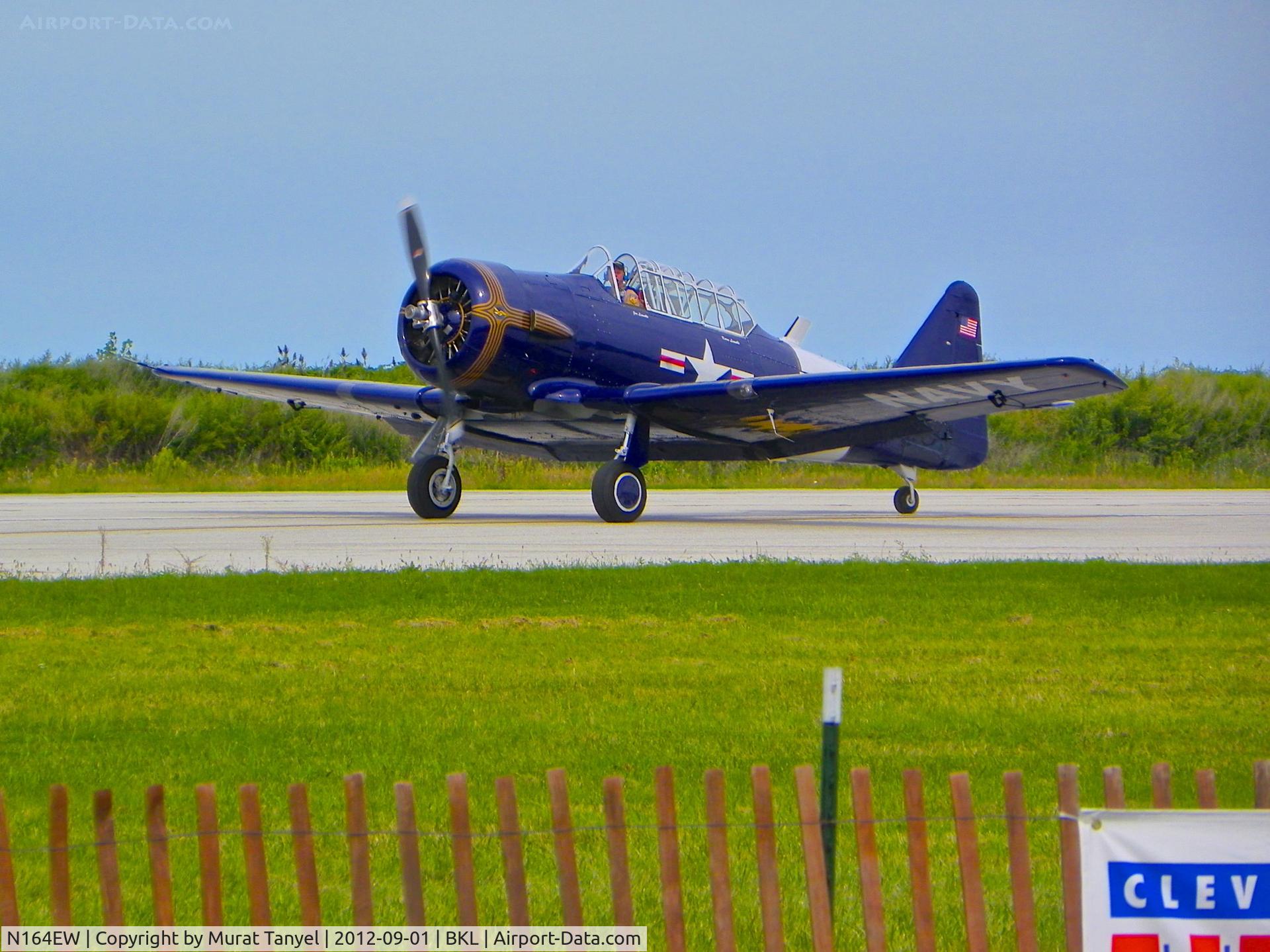 N164EW, 1943 North American AT-6C Texan C/N 88-14371, ... and, touch-dooowwwnnn!  (@ the 2012 Cleveland National Air Show)