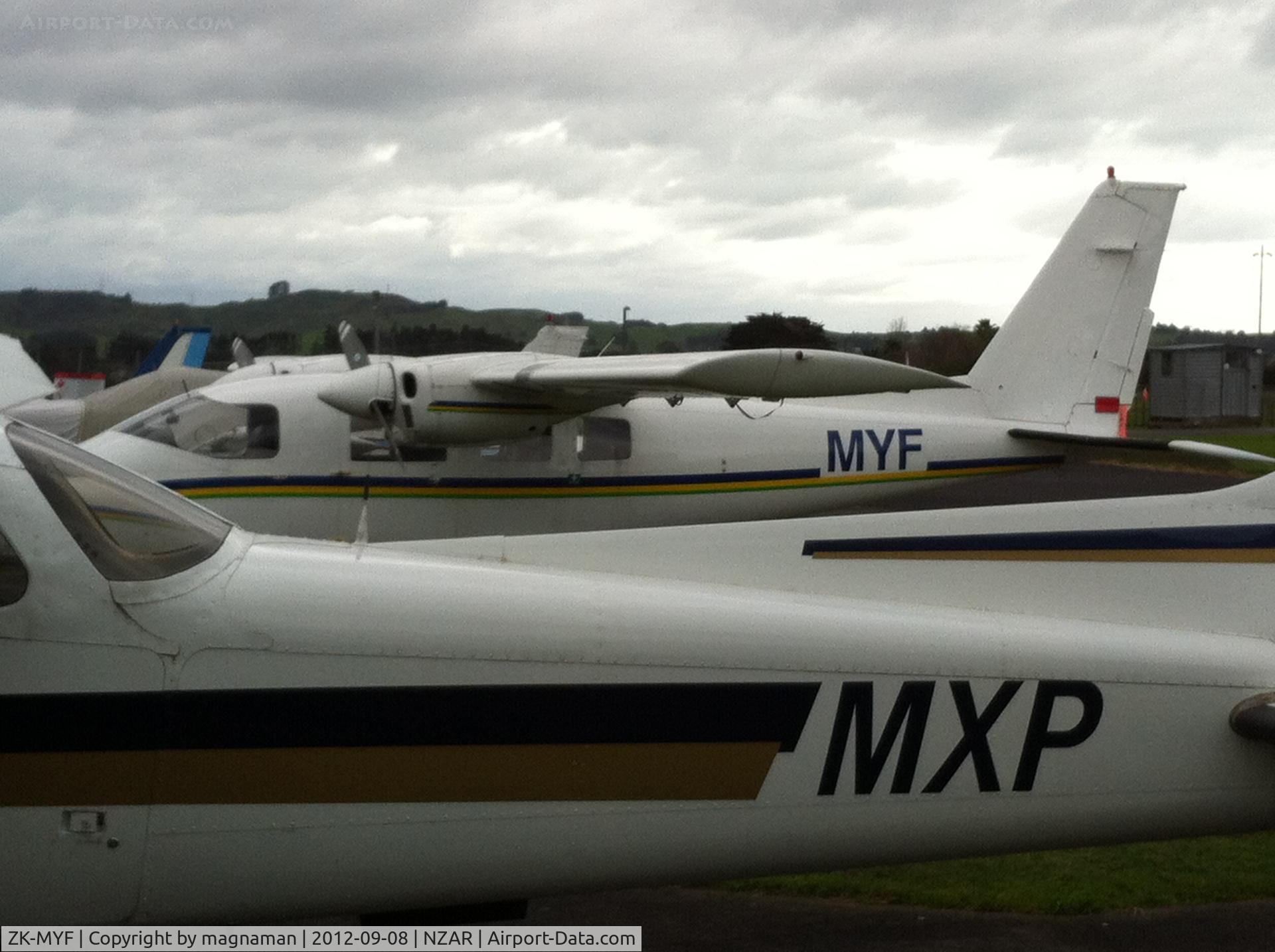 ZK-MYF, Partenavia P-68B C/N 123, Peeking out behind MXP