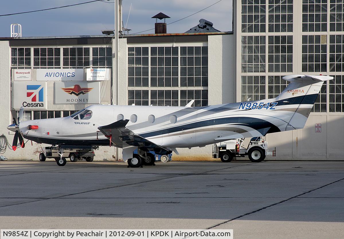 N9854Z, 2011 Pilatus PC-12/47E C/N 1302, Nice - hiding in the back of Epps Aviation