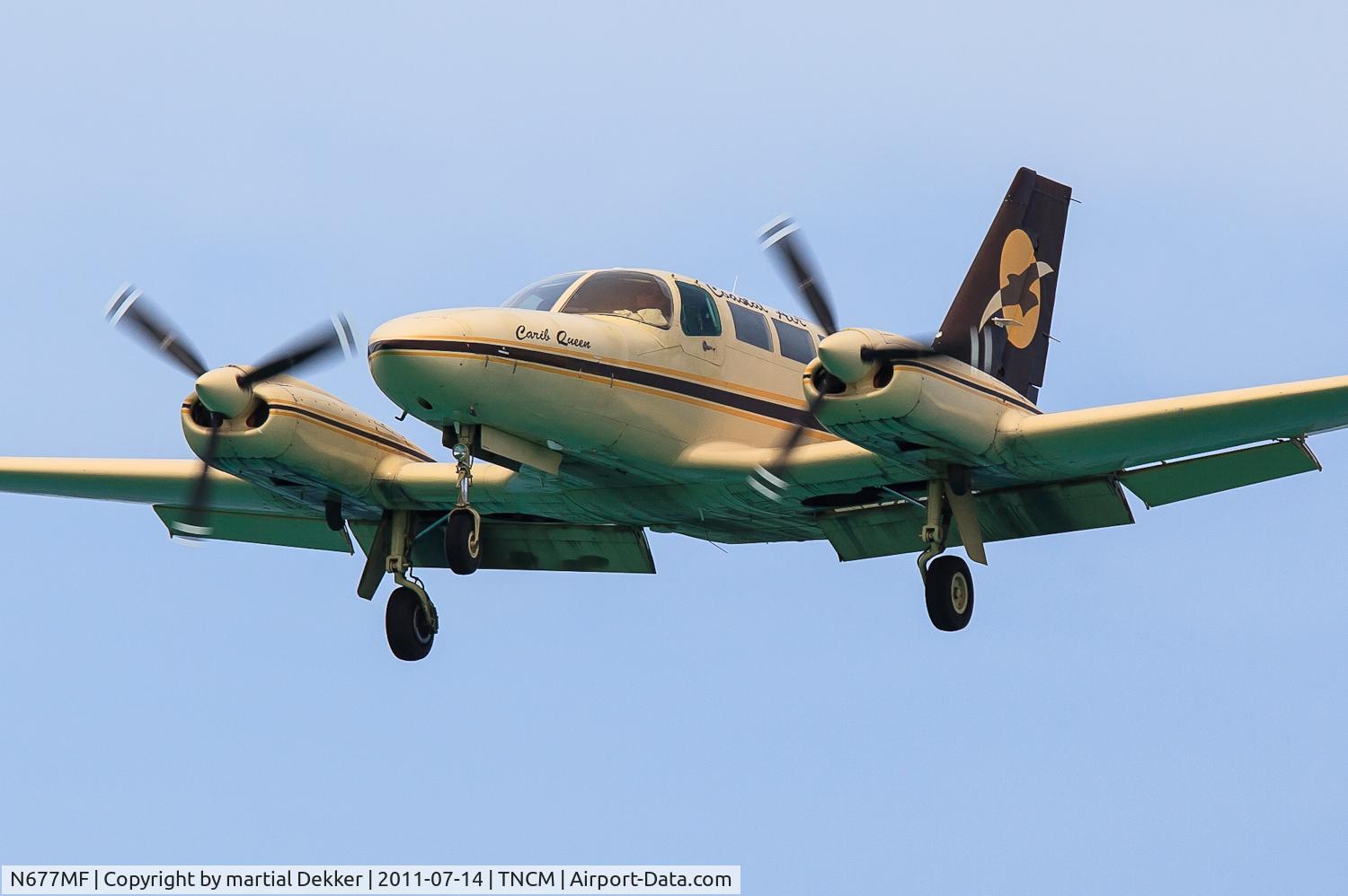 N677MF, Cessna 404 Titan C/N 404-0421, landing at SXM
