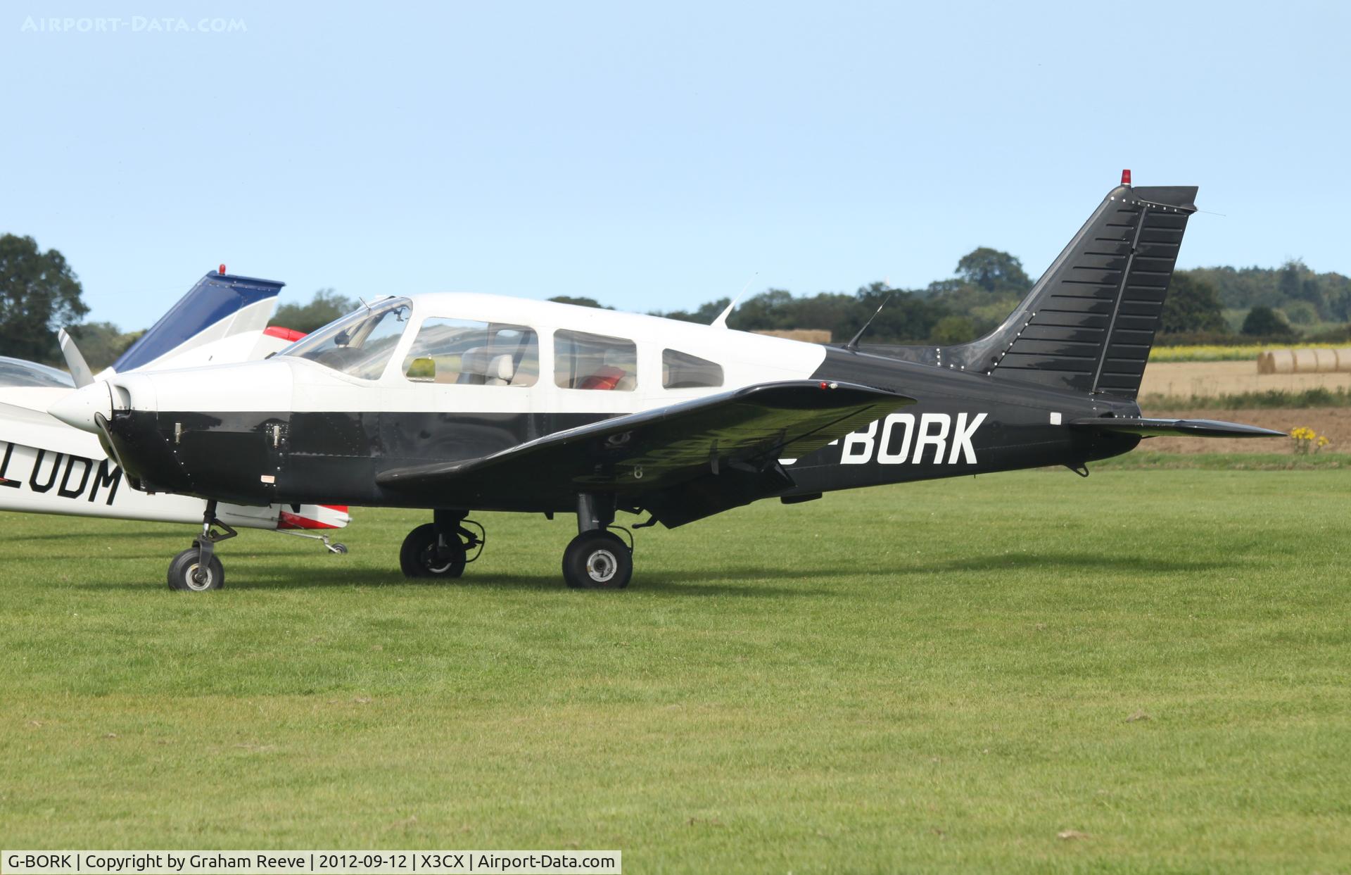 G-BORK, 1981 Piper PA-28-161 Cherokee Warrior II C/N 28-8116095, Parked in the sun.