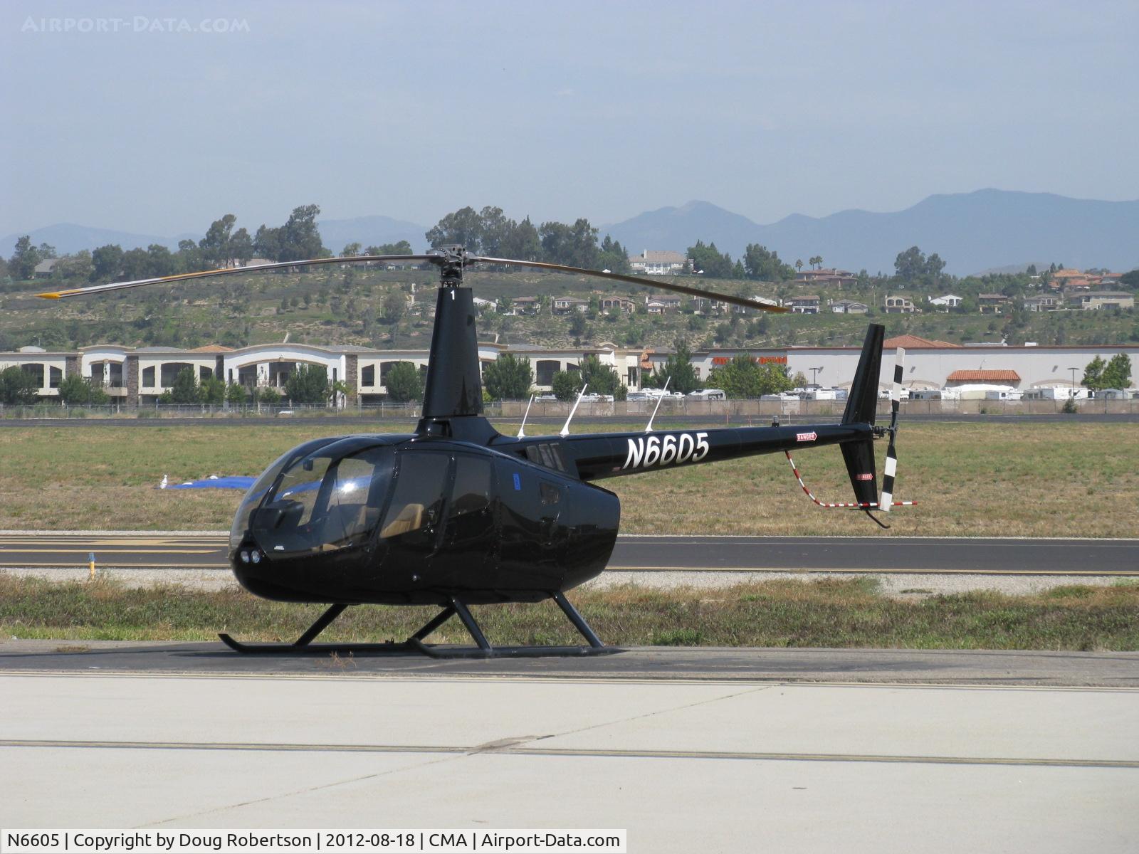 N6605, 2010 Robinson R66 Turbine C/N 0005, 2011 Robinson R66 TURBINE, one Rolls Royce R300 Turboshaft 300 Hp, on the flight line