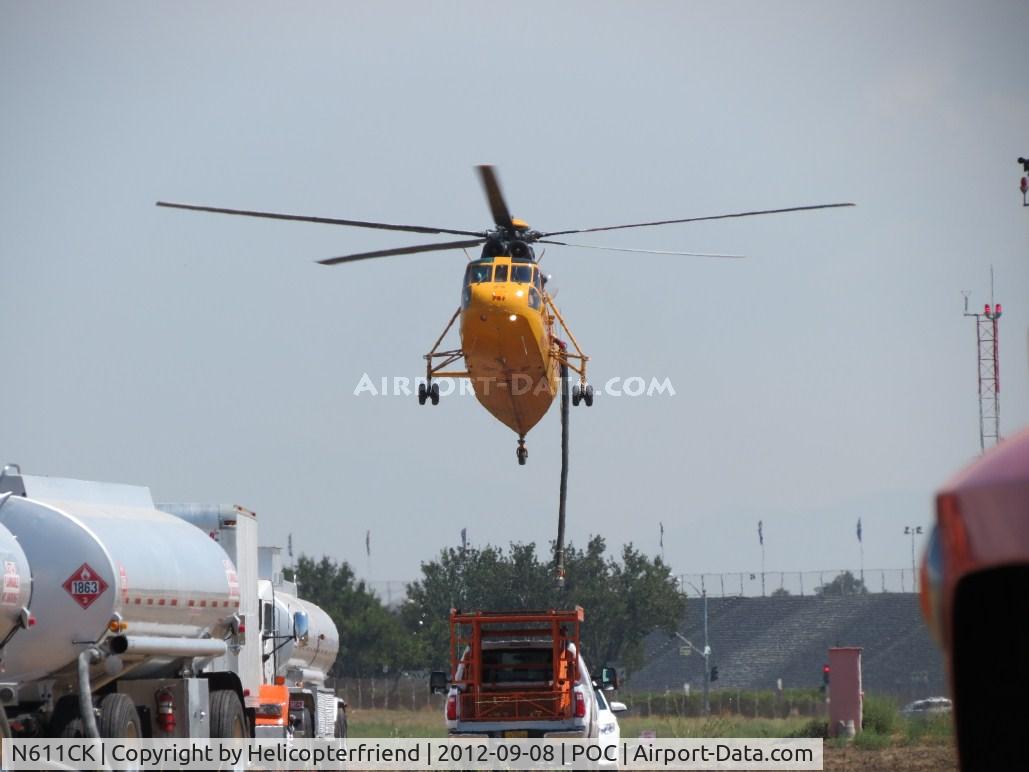 N611CK, 1961 Sikorsky SH-3H Sea King C/N 148966, Lowering down to lay snorkel down before sitting down