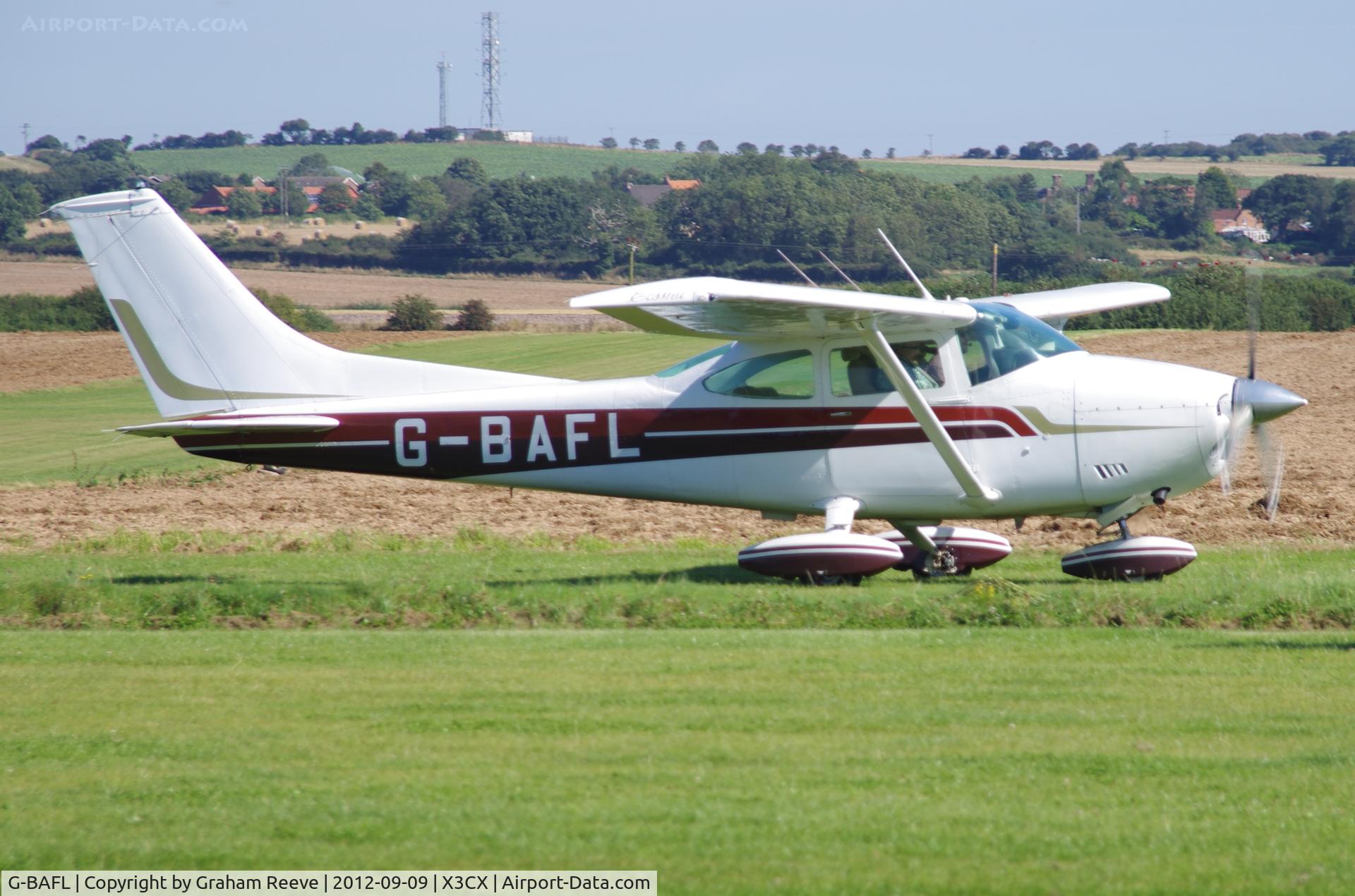 G-BAFL, 1973 Cessna 182P Skylane C/N 182-61469, Just landed.