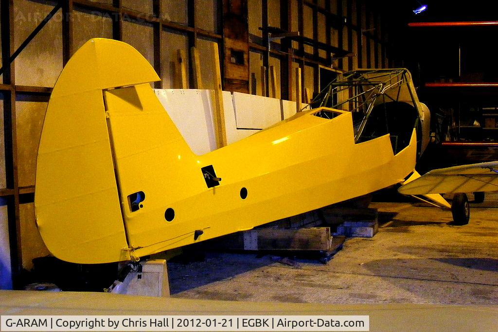 G-ARAM, 1960 Piper PA-18-150 Super Cub C/N 18-7312, Piper Cub inside one of the hangars at Sywell