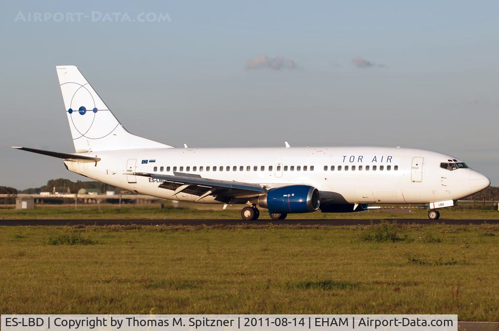 ES-LBD, 1991 Boeing 737-3Q8 SF C/N 25069, Tor Air ES-LBD roll out at 18R ( Polderbaan ). Tor Air went under in 2011; next operator Small Planet Airlines as LY-AQV