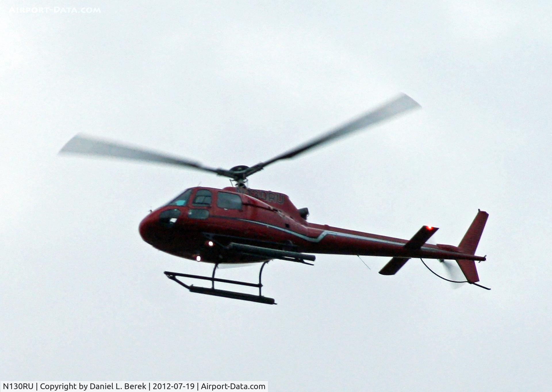 N130RU, 2007 Eurocopter AS-350B-2 Ecureuil C/N 4208, This red beauty was overflying the harbor area of Staten Island on a late summer evening.