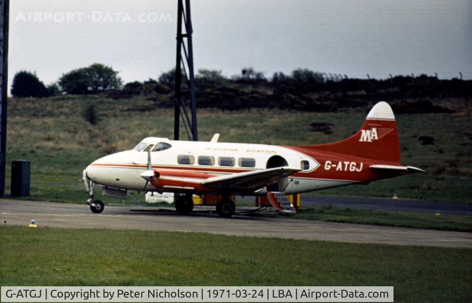 G-ATGJ, 1947 De Havilland DH-104 Riley Dove 2 C/N 04113, McAlpine Aviation Dove as seen at Yeadon in March 1971.