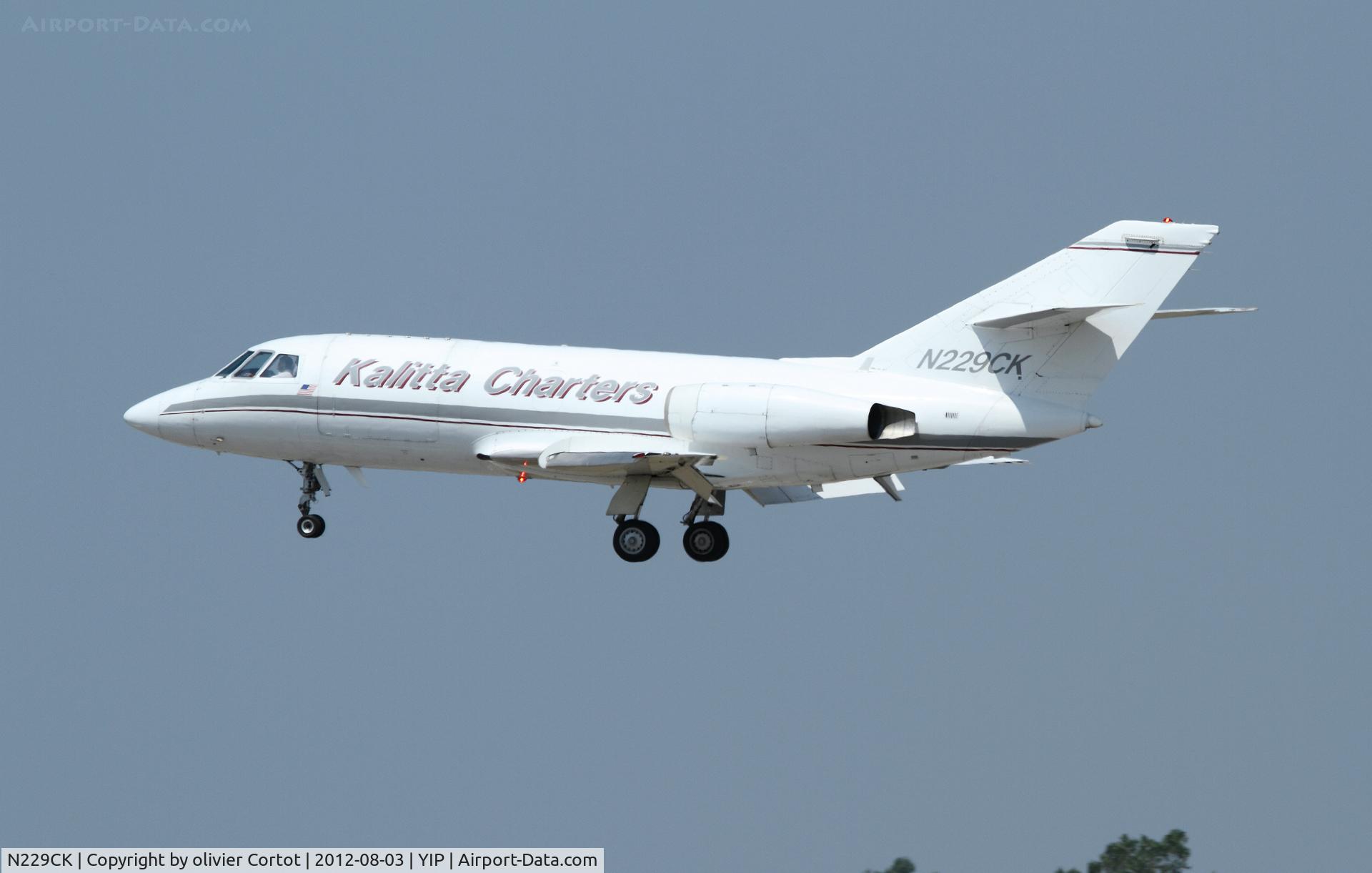 N229CK, 1970 Dassault Fan Jet Falcon (20D) C/N 229, landing at willow run airport