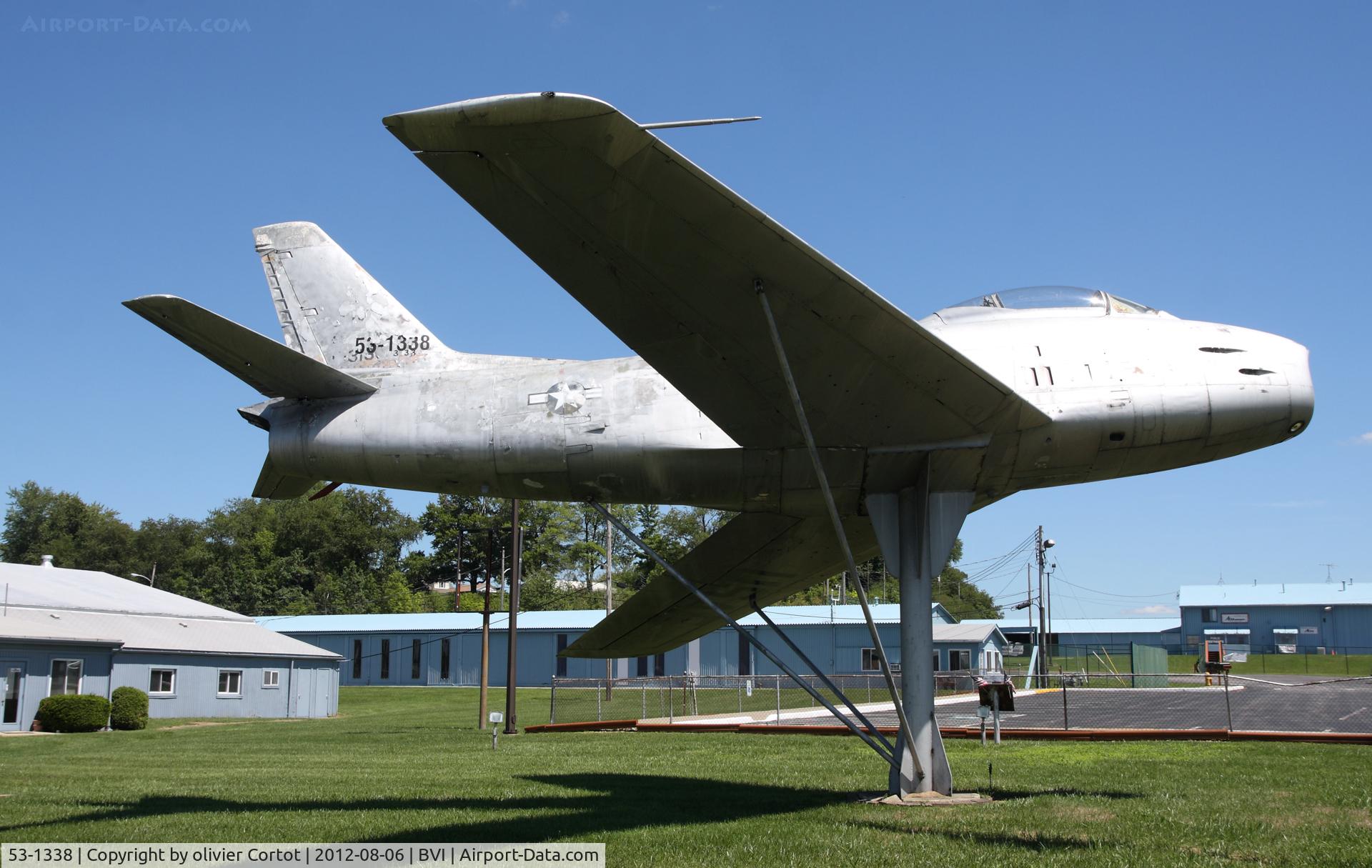 53-1338, 1953 North American F-86H Sabre C/N 203-110, a pair of fouga magisters are parked close to this F-86