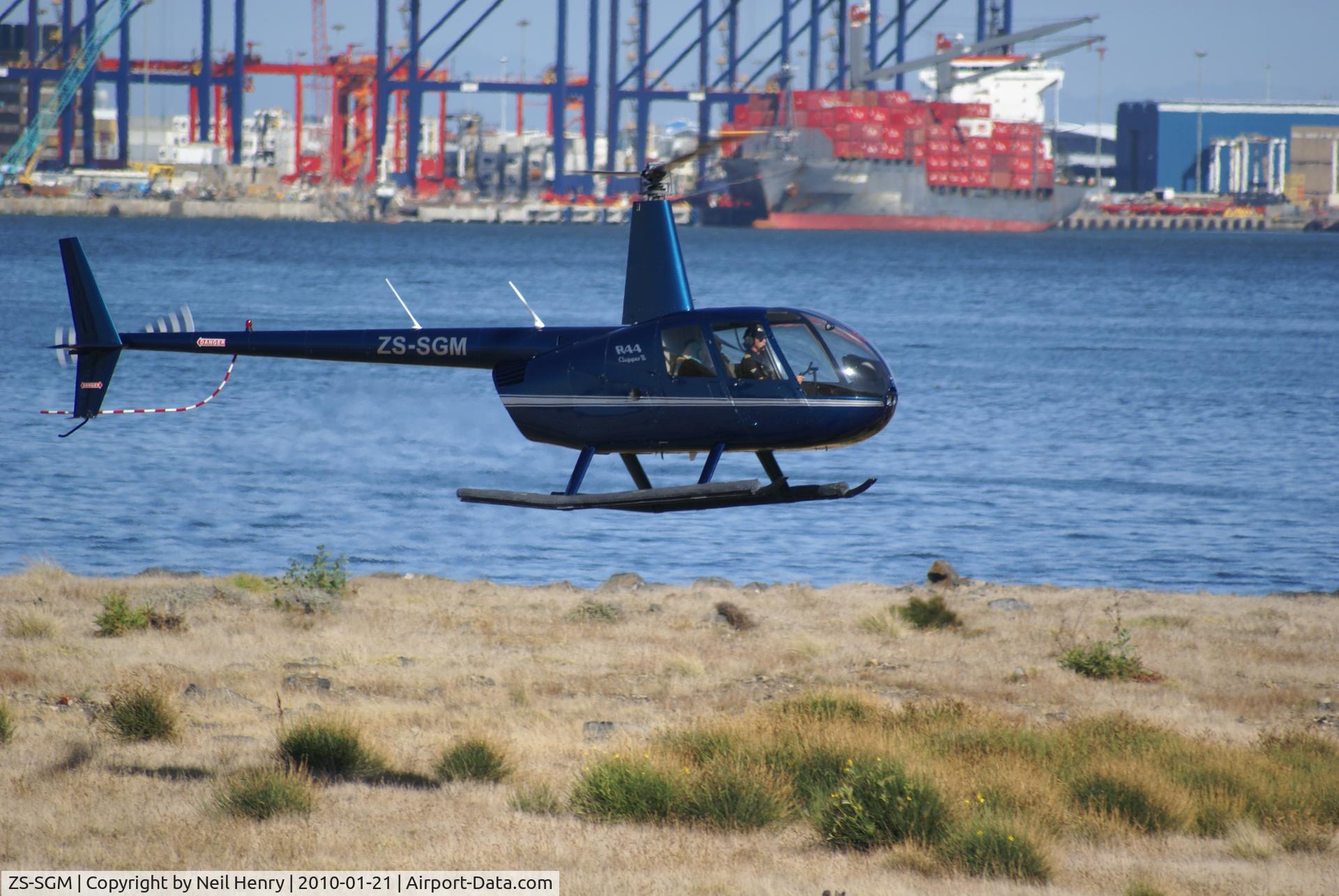 ZS-SGM, Robinson R44 Clipper II C/N 11634, taken January 2010- in use for pleasure flights from V&A Waterfront in Cape Town, South Africa