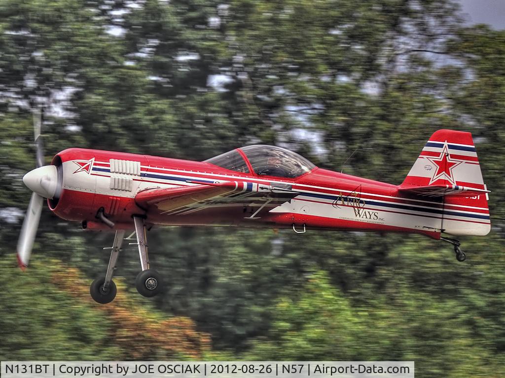 N131BT, 1995 Sukhoi Su-31 C/N 03-01, leaving New Garden