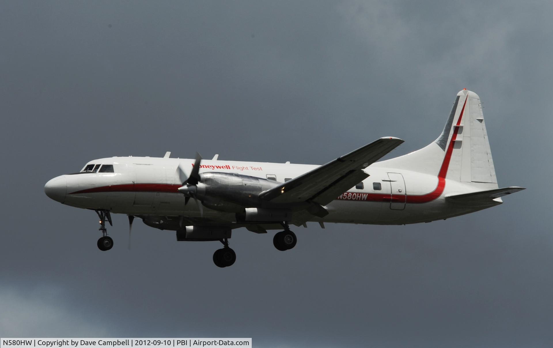 N580HW, 1952 Convair CV-340-31 (CV-580) C/N 2, N580HW landing PBI 9.10.12