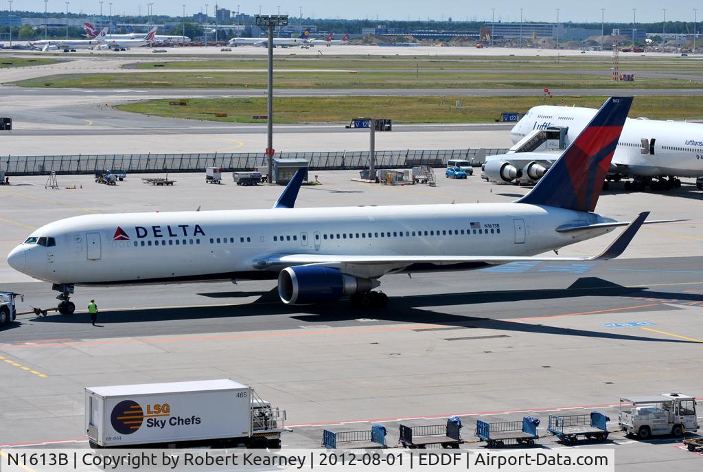 N1613B, 2001 Boeing 767-332 C/N 32776, On pushback from stand