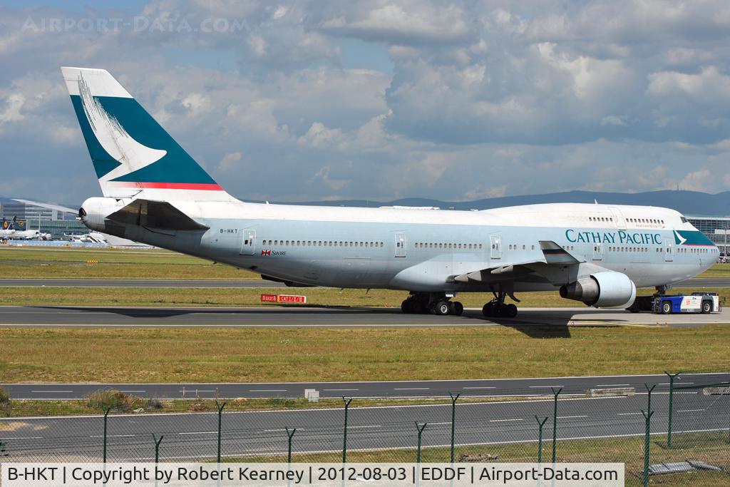 B-HKT, 1992 Boeing 747-412 C/N 27132, Being towed around to parking