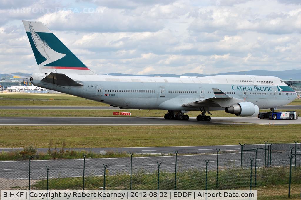 B-HKF, Boeing 747-412 C/N 25128, Being towed around to parking