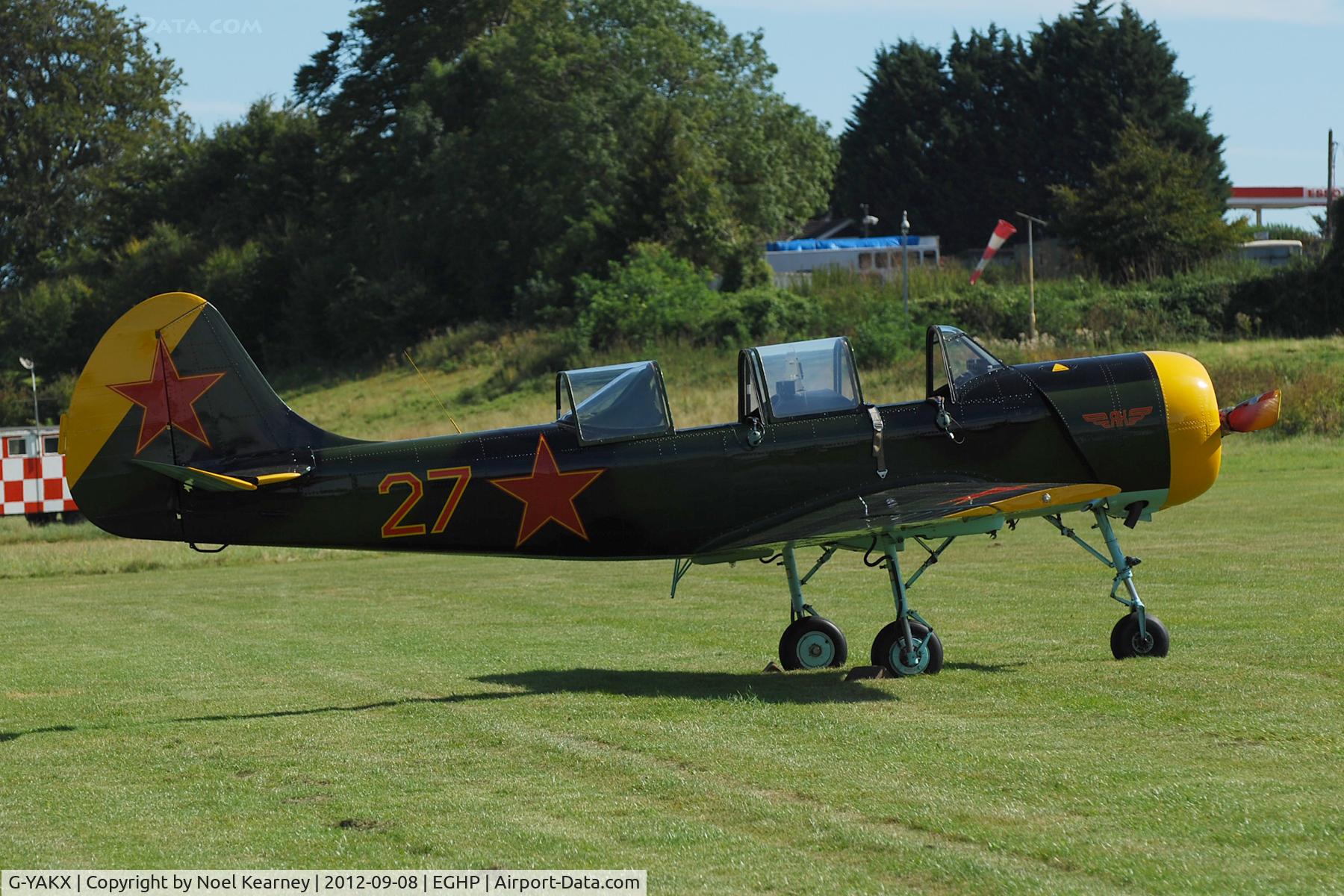 G-YAKX, 1991 Yakovlev (Aerostar) Yak-52 C/N 9111307, Photographed at the Vintage Fly-in at Popham Airfield Sept '12