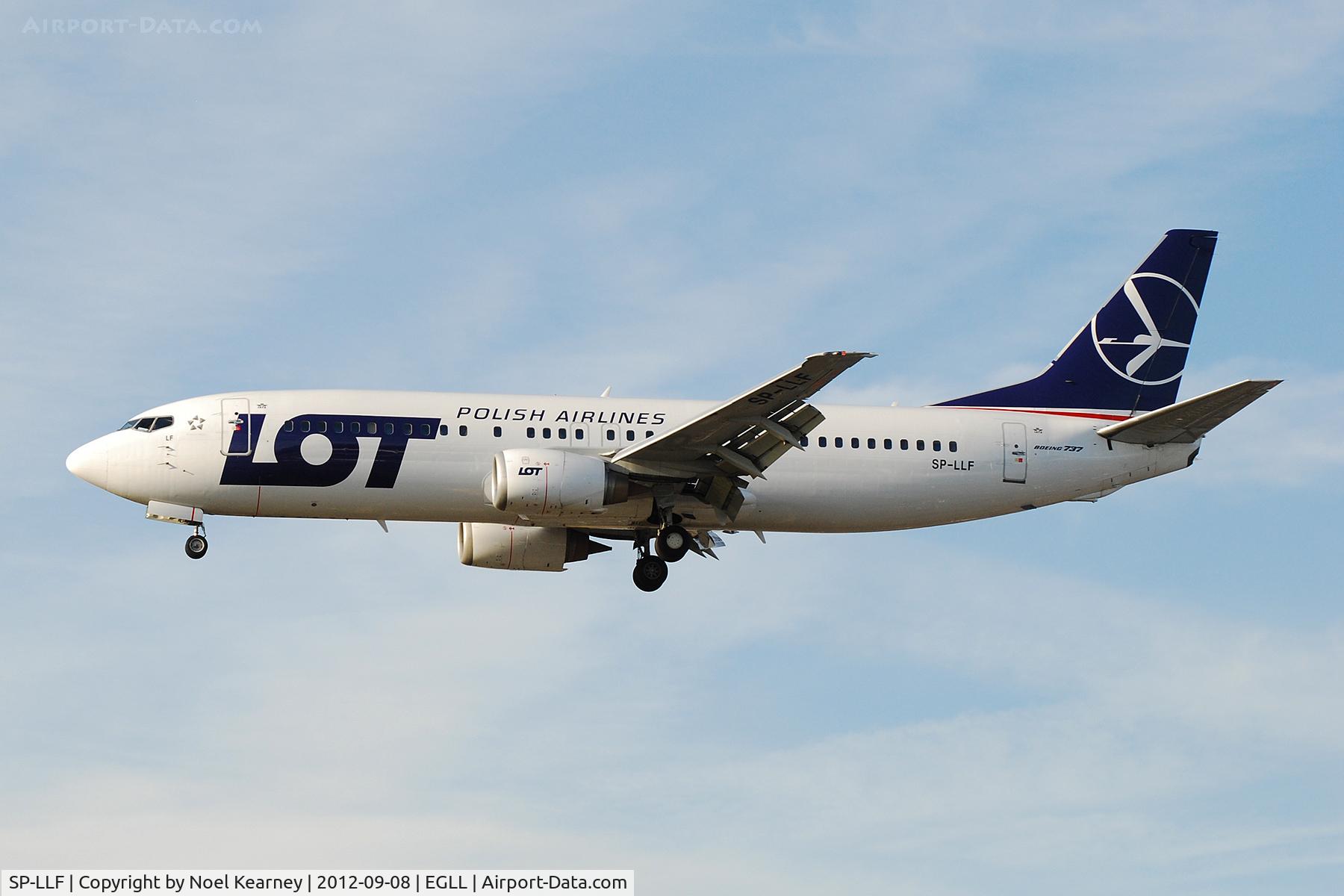 SP-LLF, 1997 Boeing 737-45D C/N 28752/2874, Seen landing Rwy 27R at Heathrow Apt.
