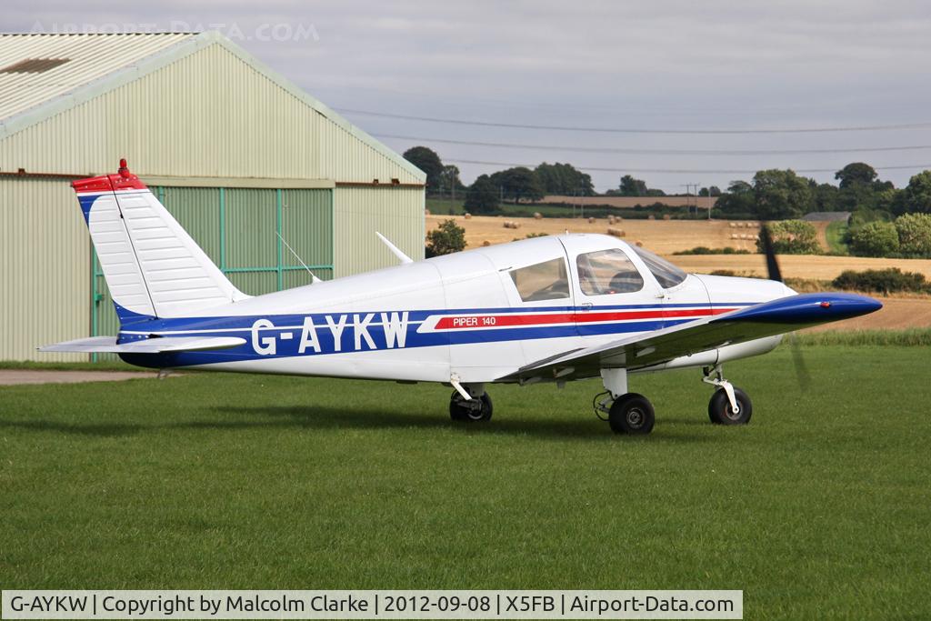 G-AYKW, 1970 Piper PA-28-140 Cherokee C/N 28-26931, Piper PA-28-140 Cherokee warms up for a local flight at Fishburn Airfield UK, September 2012.