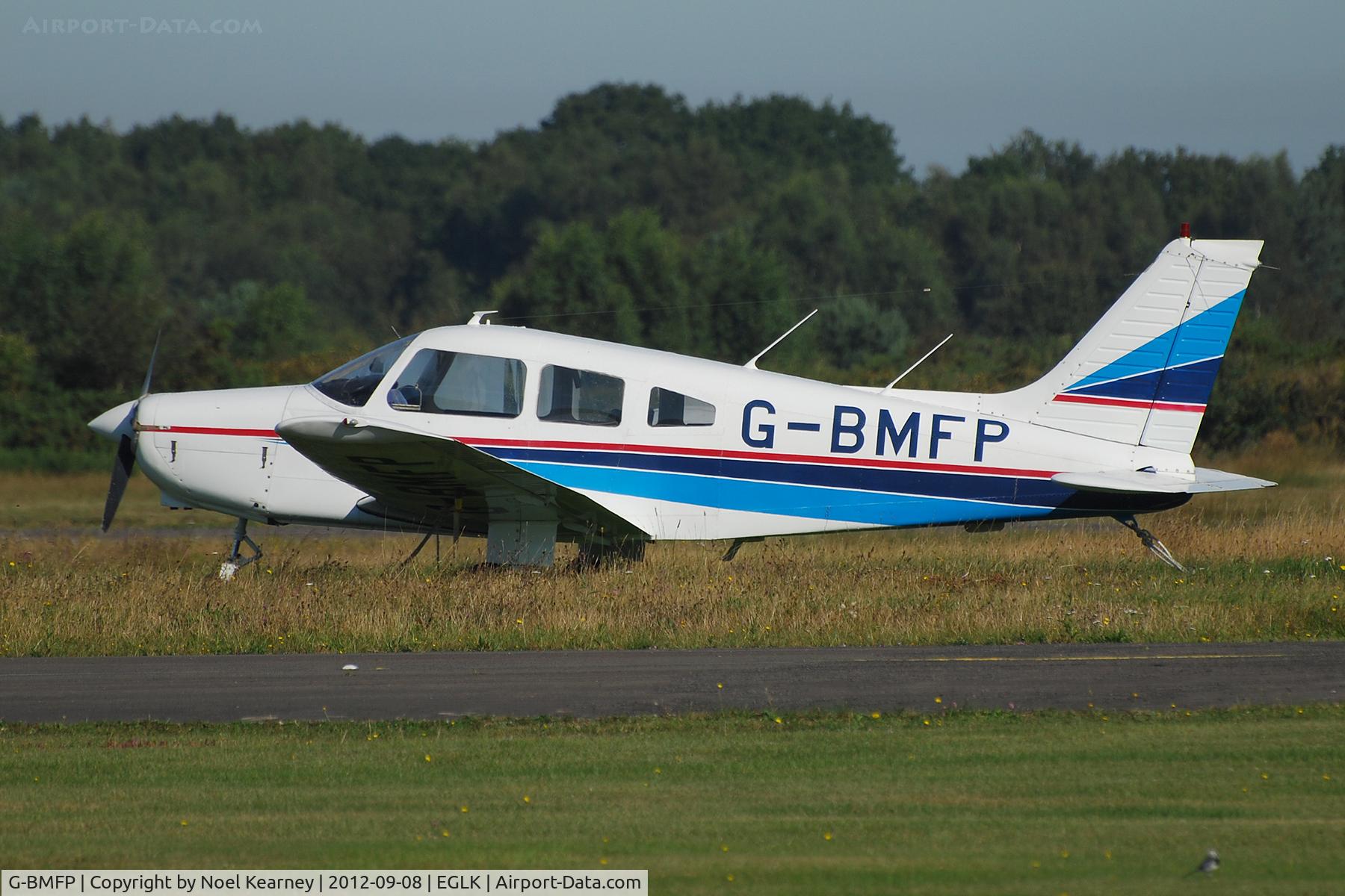 G-BMFP, 1979 Piper PA-28-161 Cherokee Warrior II C/N 28-7916243, Parked on the apron at Blackbushe.