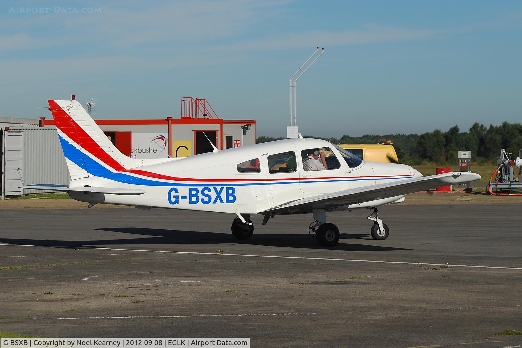 G-BSXB, 1984 Piper PA-28-161 Cherokee Warrior II C/N 28-8416125, Parked on the apron at Blackbushe.