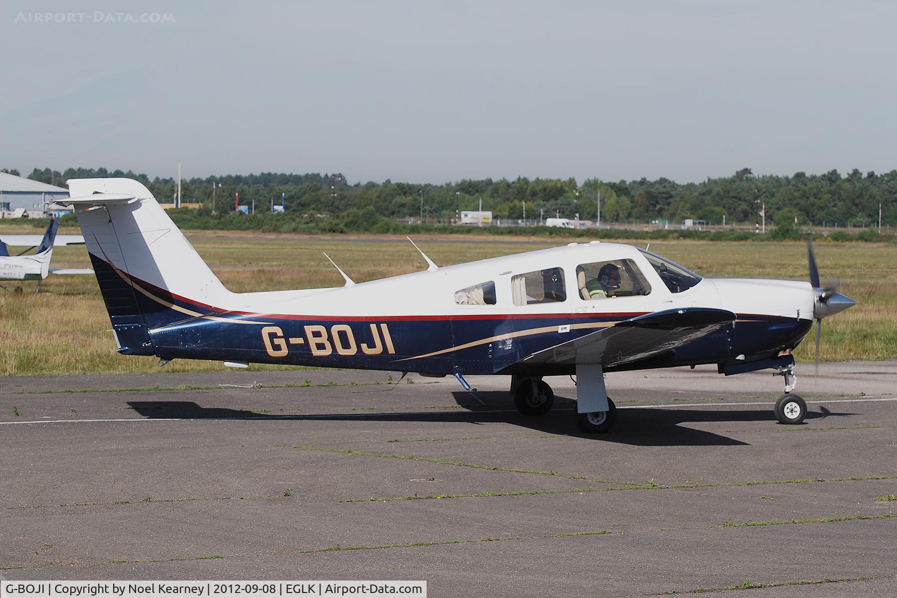 G-BOJI, 1979 Piper PA-28RT-201 Arrow IV C/N 28R-7918221, Parked on the apron at Blackbushe.