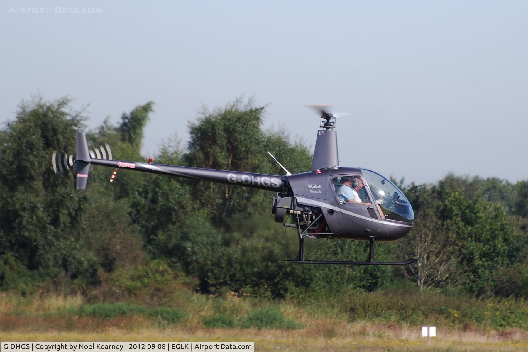 G-DHGS, 1996 Robinson R22 Beta C/N 2592, Air taxi-ing at Blackbushe.