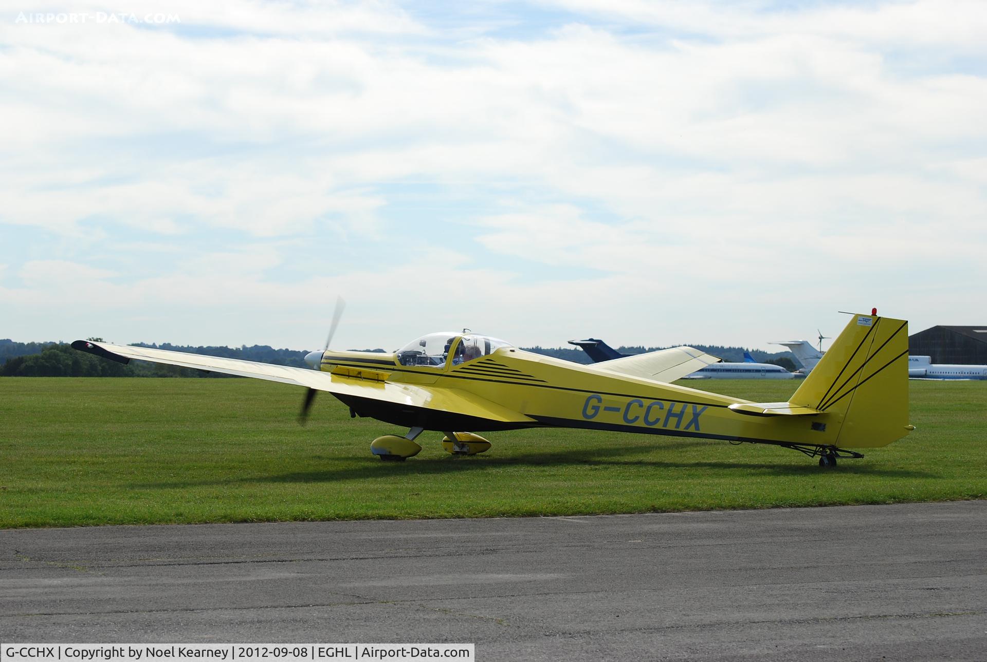 G-CCHX, 2003 Scheibe SF-25C Falke C/N 44694, Parked on the grass at Lasham.