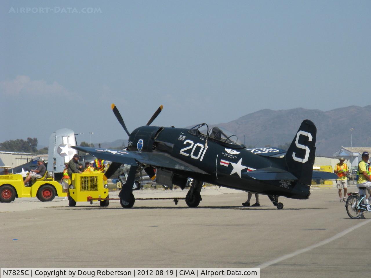 N7825C, 1948 Grumman F8F-2 (G58) Bearcat C/N D.1227, 1949 Grumman F8F-2 BEARCAT, P&W R-2800-34W 2,100 Hp, in tow on flight line. Aircraft is a 1949, not 1948 as registered.