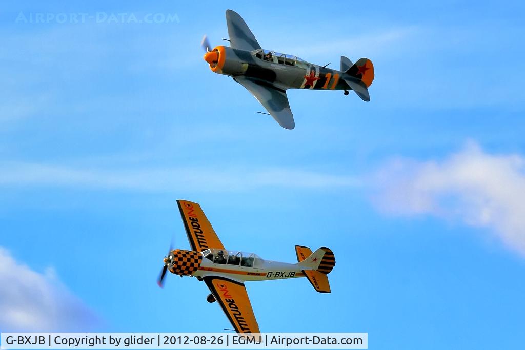 G-BXJB, 1987 Bacau Yak-52 C/N 877403, Yak duo fly by