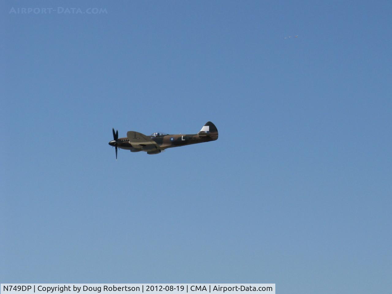 N749DP, 1945 Supermarine Spitfire XIV C/N 6S/583887, 1983 Vickers/Supermarine SPITFIRE Mk.XIVe, Rolls Royce GRIFFON 65 V-12 2,050 hp, overflight 26
