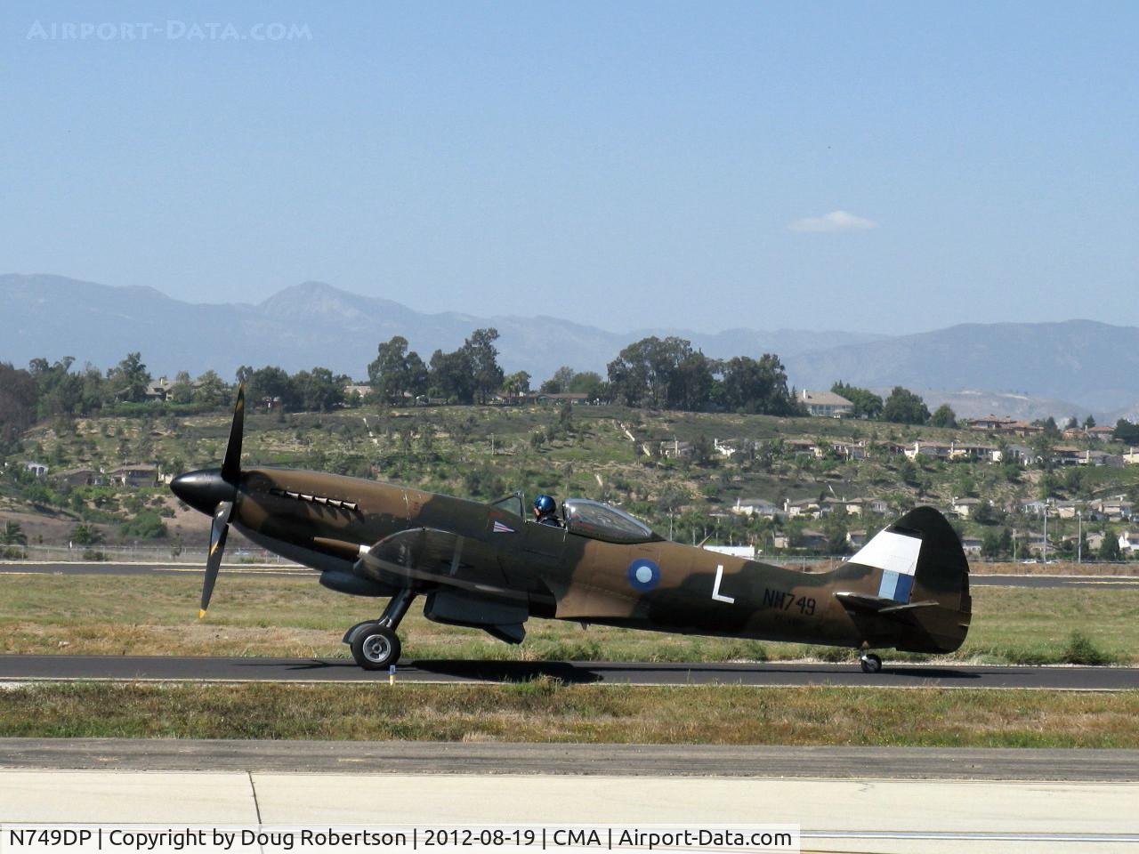 N749DP, 1945 Supermarine Spitfire XIV C/N 6S/583887, 1983 Vickers/Supermarine SPITFIRE Mk.XIVe, Rolls Royvce GRIFFON 65 V-12 2,050 Hp, ex-David Price aircraft, taxi to 26