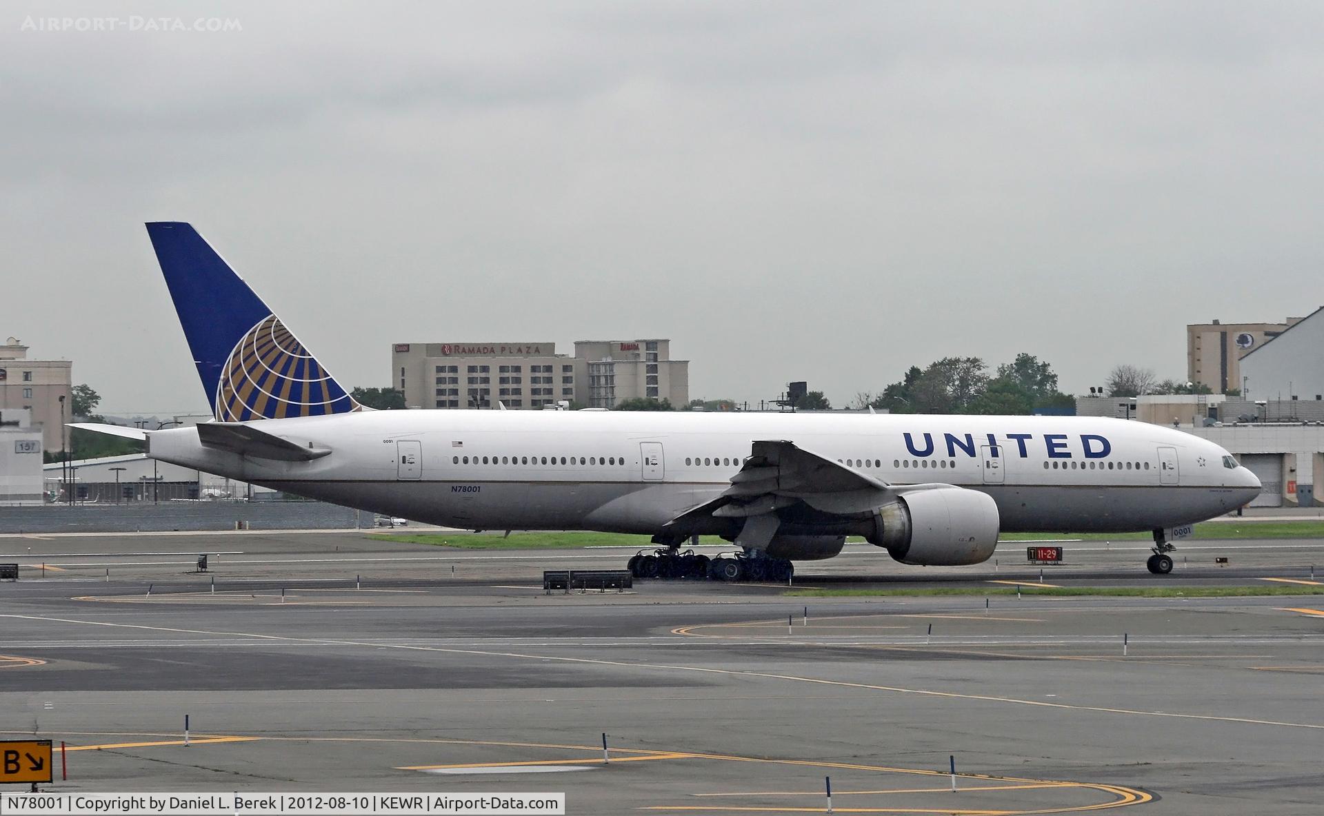 N78001, 1998 Boeing 777-224 C/N 27577, Bound for Beijing, a United Boeing 777 makes her way to join the take-off queue.