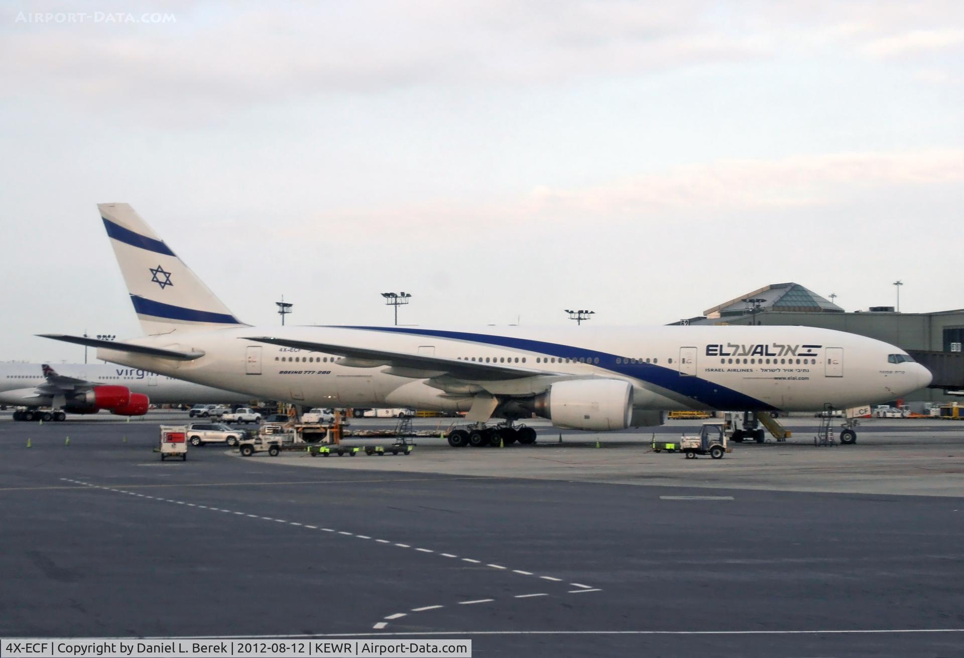 4X-ECF, 2007 Boeing 777-258/ER C/N 36084, It's very rare I get such a view of an El Al aircraft.  They usually park out beyond the terminal at Newark, allowing only for a head-on shot.  The bright early-morning sunlight highlights the handsome aircraft's lines.