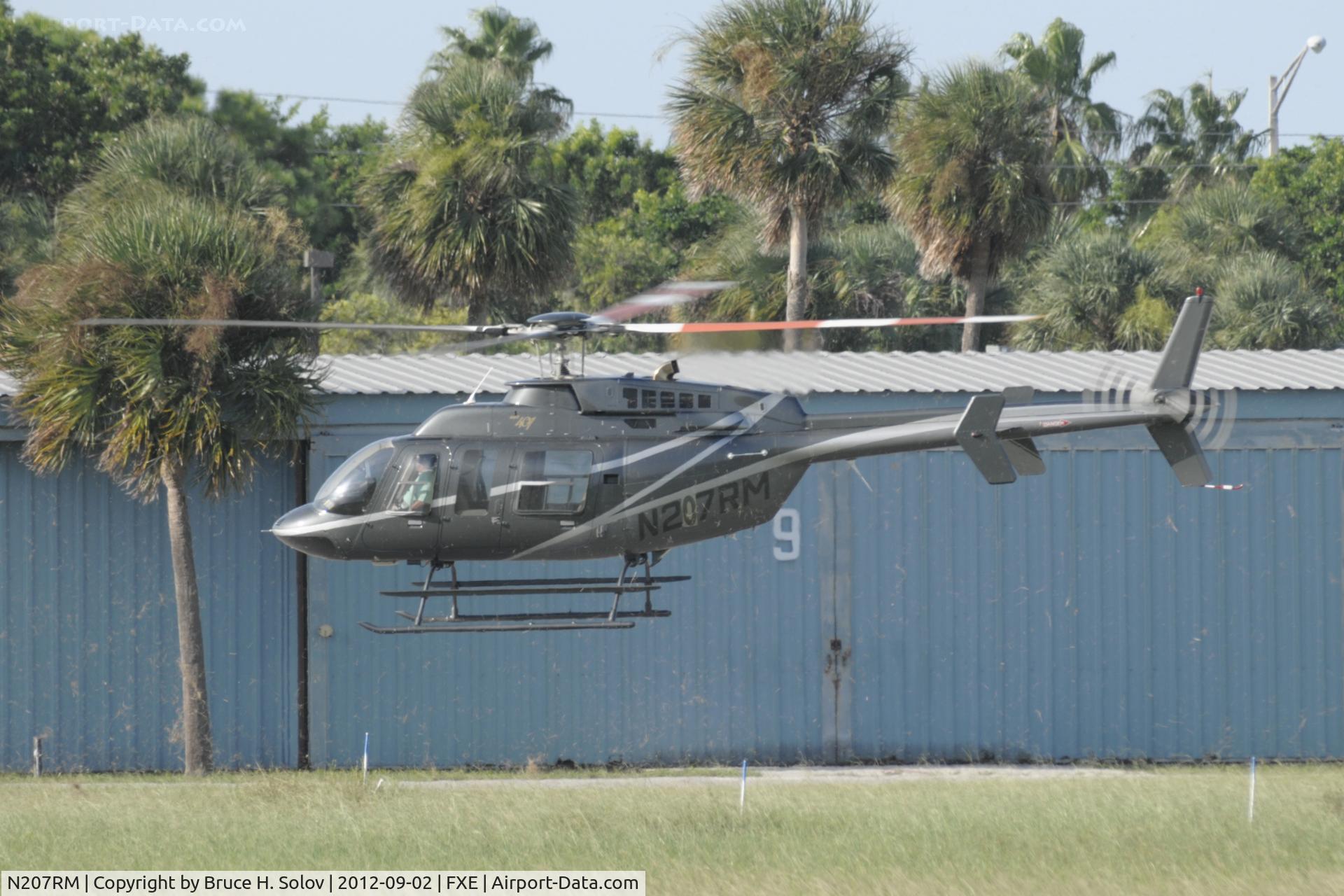 N207RM, Bell 407 C/N 53614, Landing at FXE
