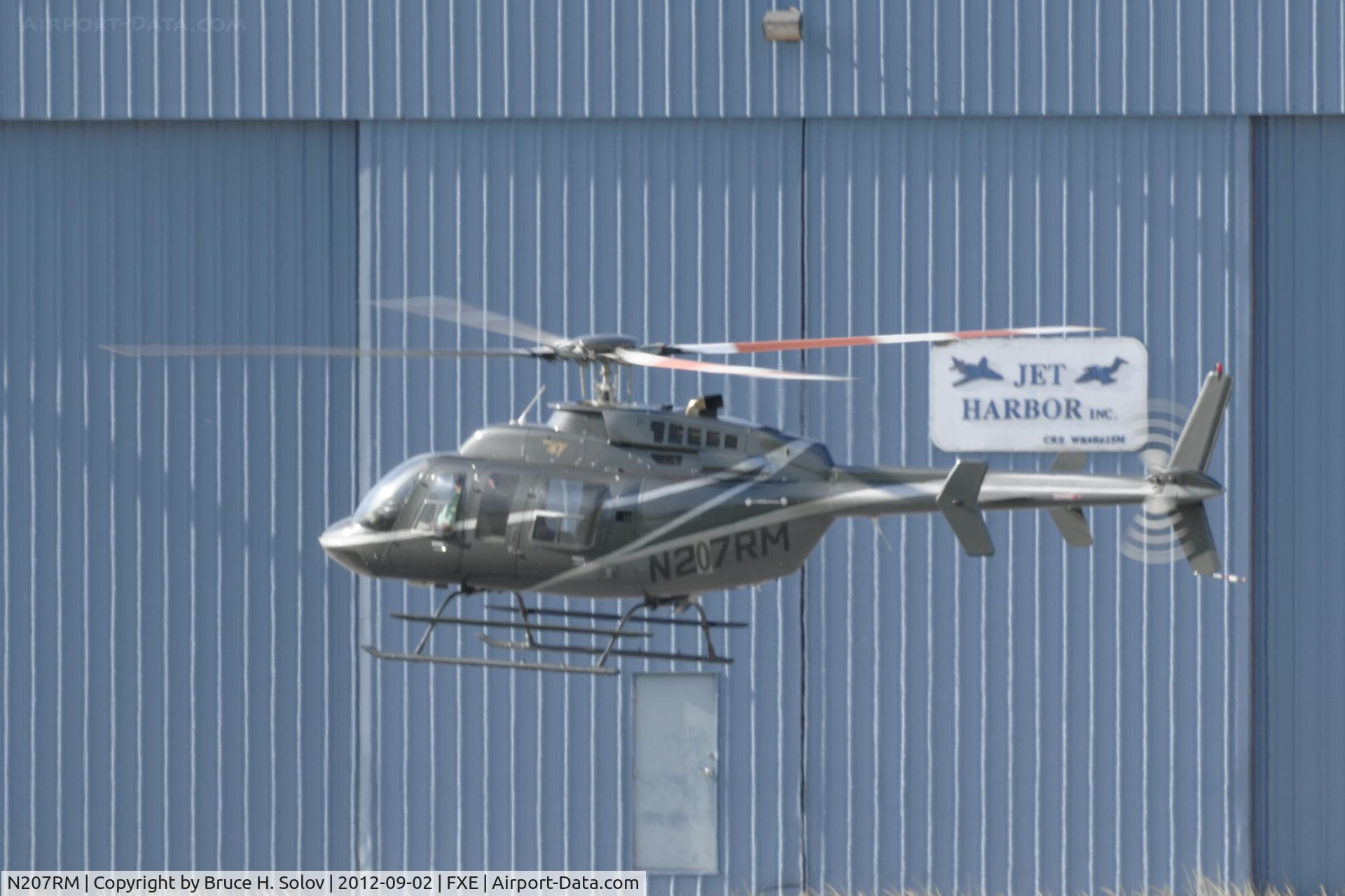 N207RM, Bell 407 C/N 53614, Landing at FXE