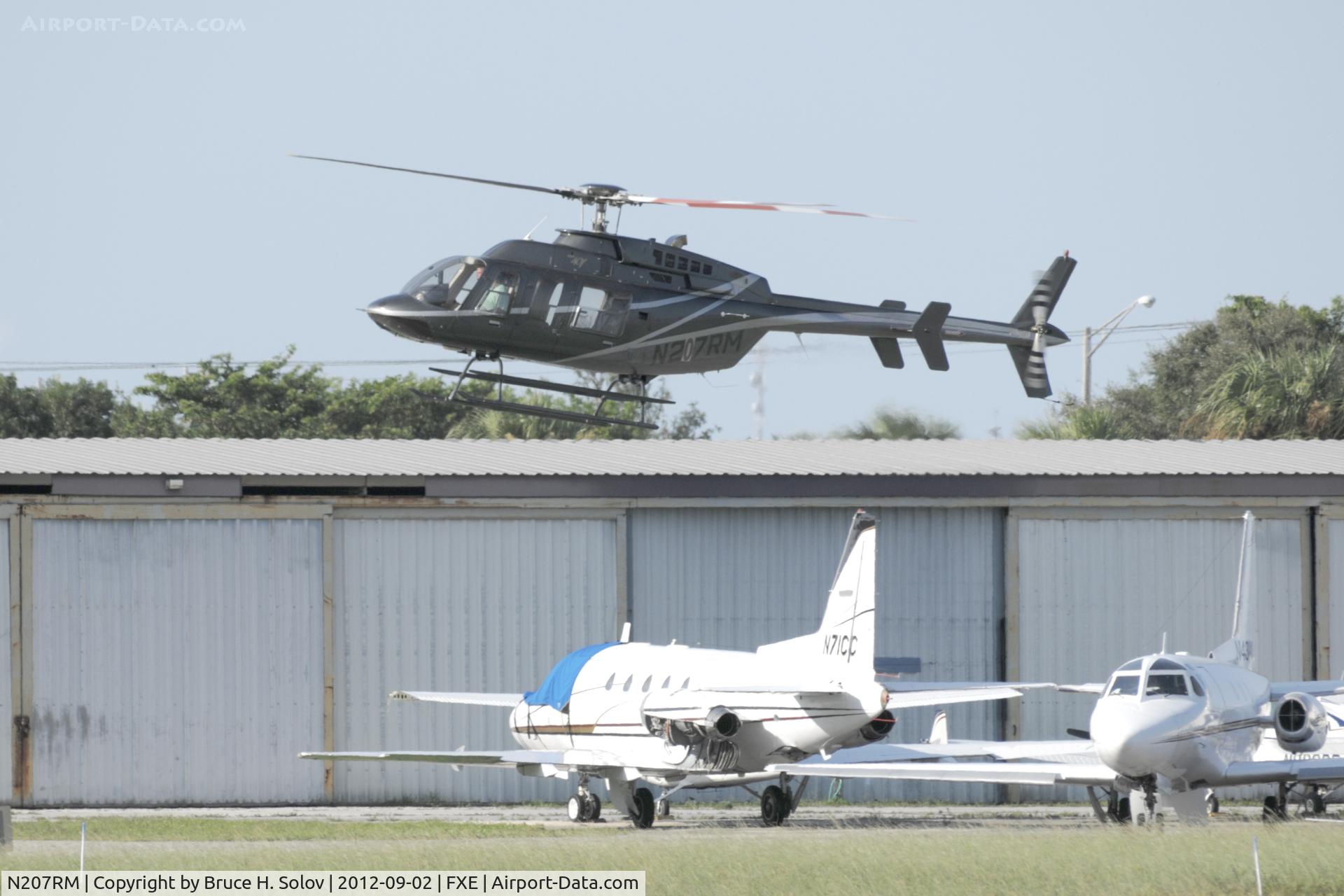 N207RM, Bell 407 C/N 53614, Landing at FXE