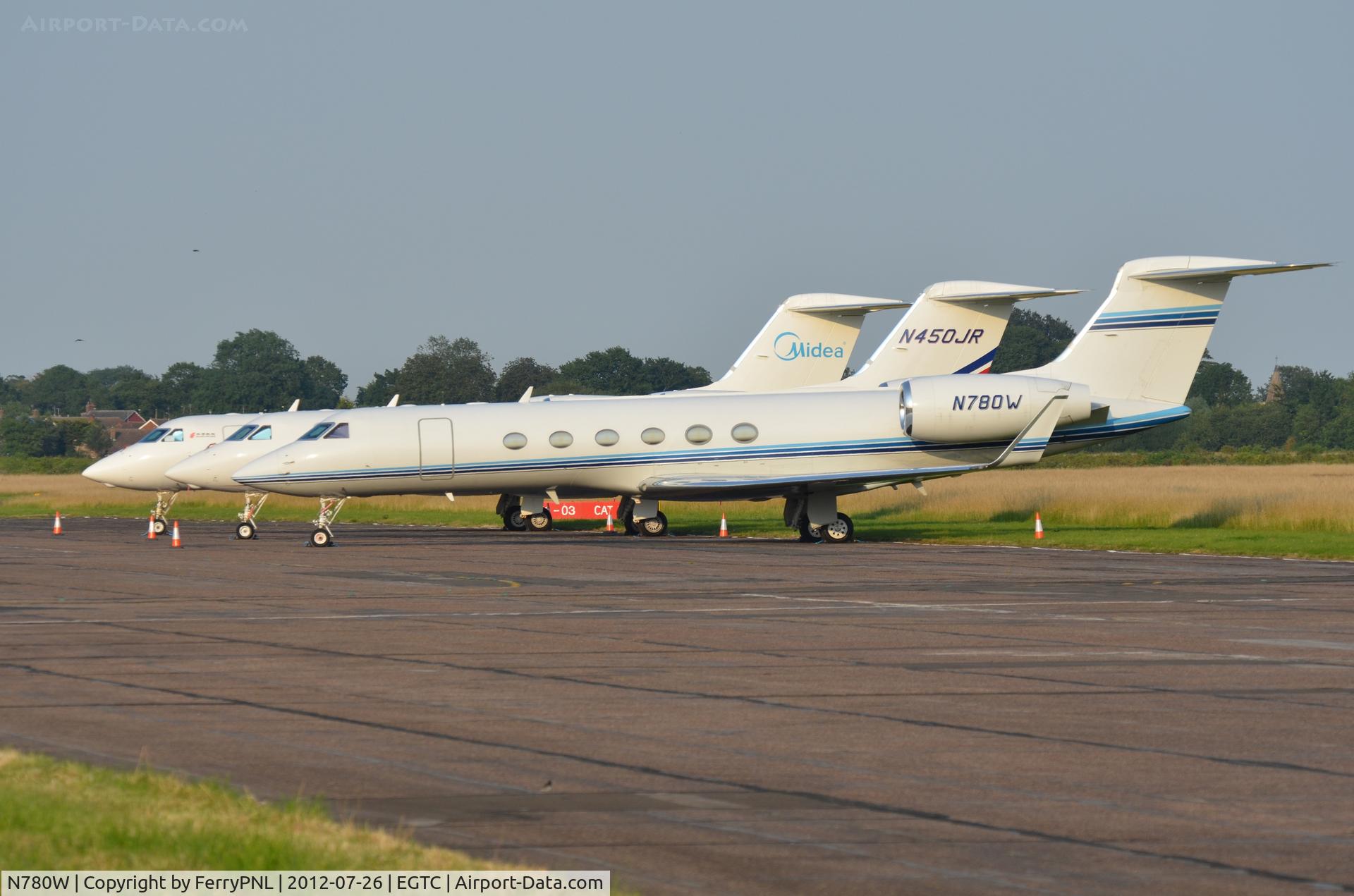 N780W, 1997 Gulfstream Aerospace G-V C/N 530, A few of the aircraft parked at Cranfield . These aircraft came from Luton and were ferried to Cranfield due to capacity reasons because of the Olympics 2012 opening ceremony next day.